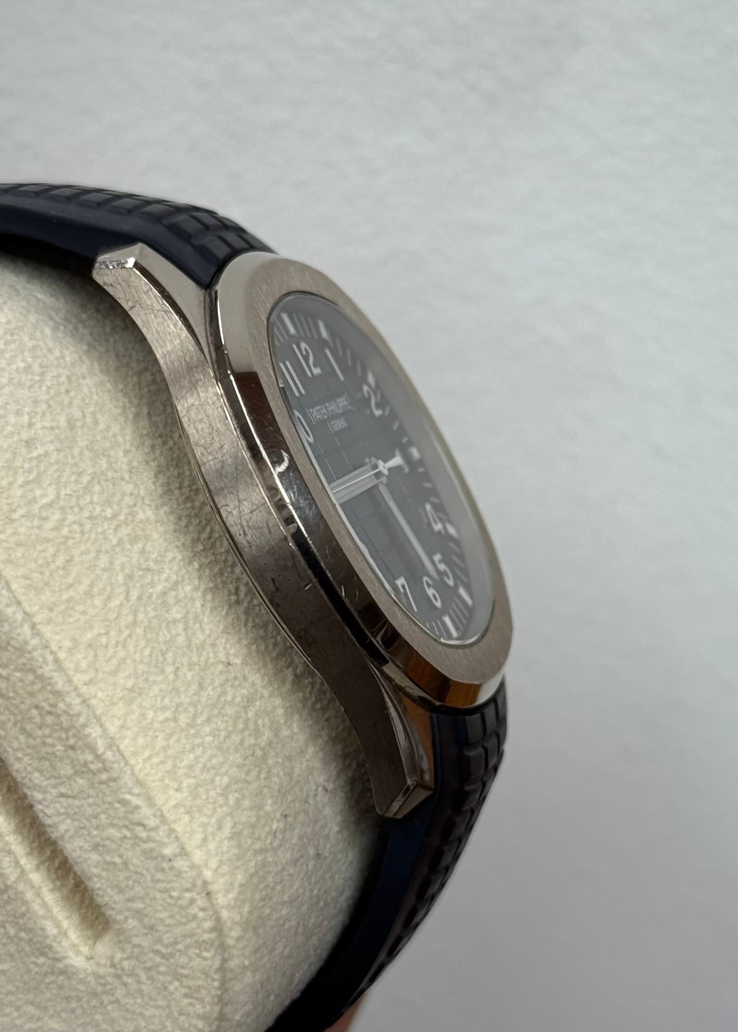 May be an image of wrist watch and text