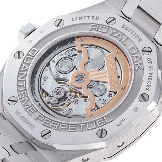 May be an image of wrist watch and text that says 'မ LIMITED ROYAL D DITION ារអអរ្ស 4 ጥ DAK O OF35PIECES a 0 QUANTIEO ٥ ወ D ن W O ANTEME esees PERPETUEL Au750 Au750 ZAN D ت'