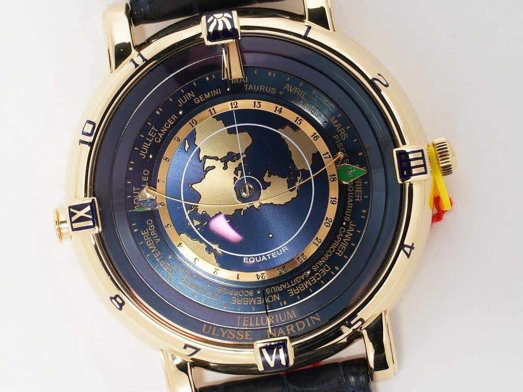 May be an image of map, digital watch and text that says ' MLOSEE MNS 16 IX 6 自 00 27 EQUATEUR 70 EQUAT EUR 7 8 のWヨ ن 00 I SHEW크) TELLURIUM TELLUR ULYSSE ARDIN IUM lM'