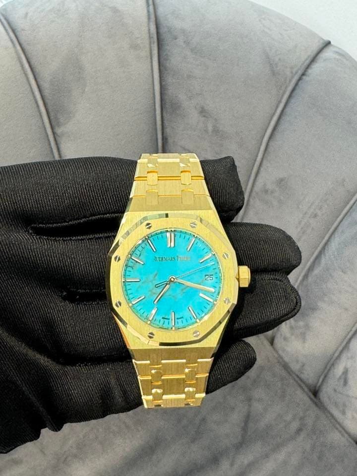 May be an image of wrist watch and text