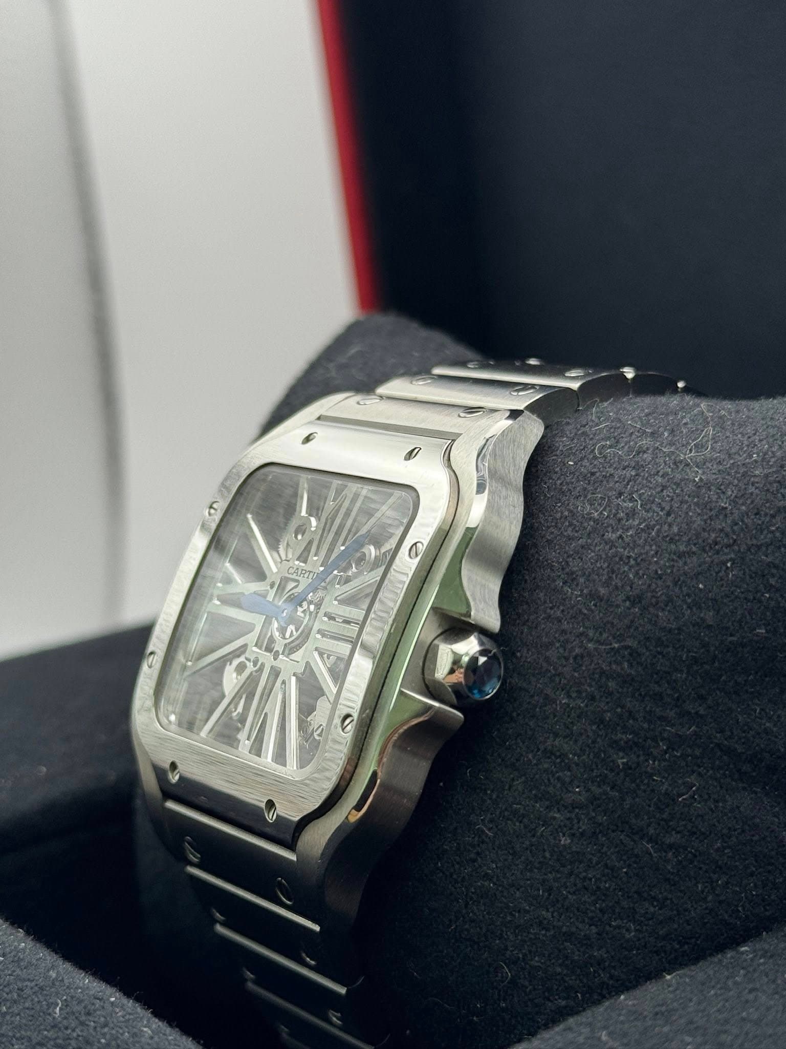 May be an image of wrist watch and text
