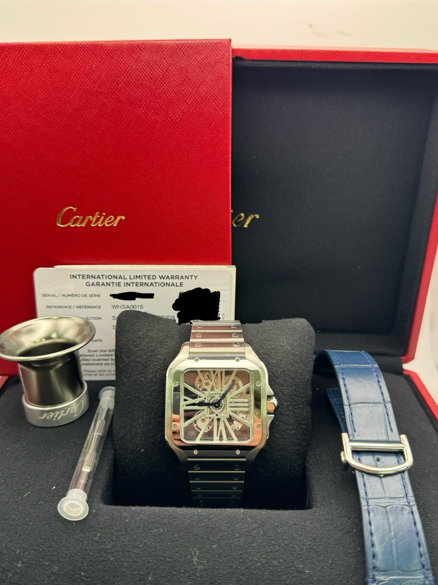 May be an image of wrist watch and text that says 'Cartier Ca tier INTERNATIONAL INTERNATIONALLIMITEDWARRANTY LIMITED WARRANTY GARANTIE GARANTIEINTERNATIONALE INTERNATIONALE…