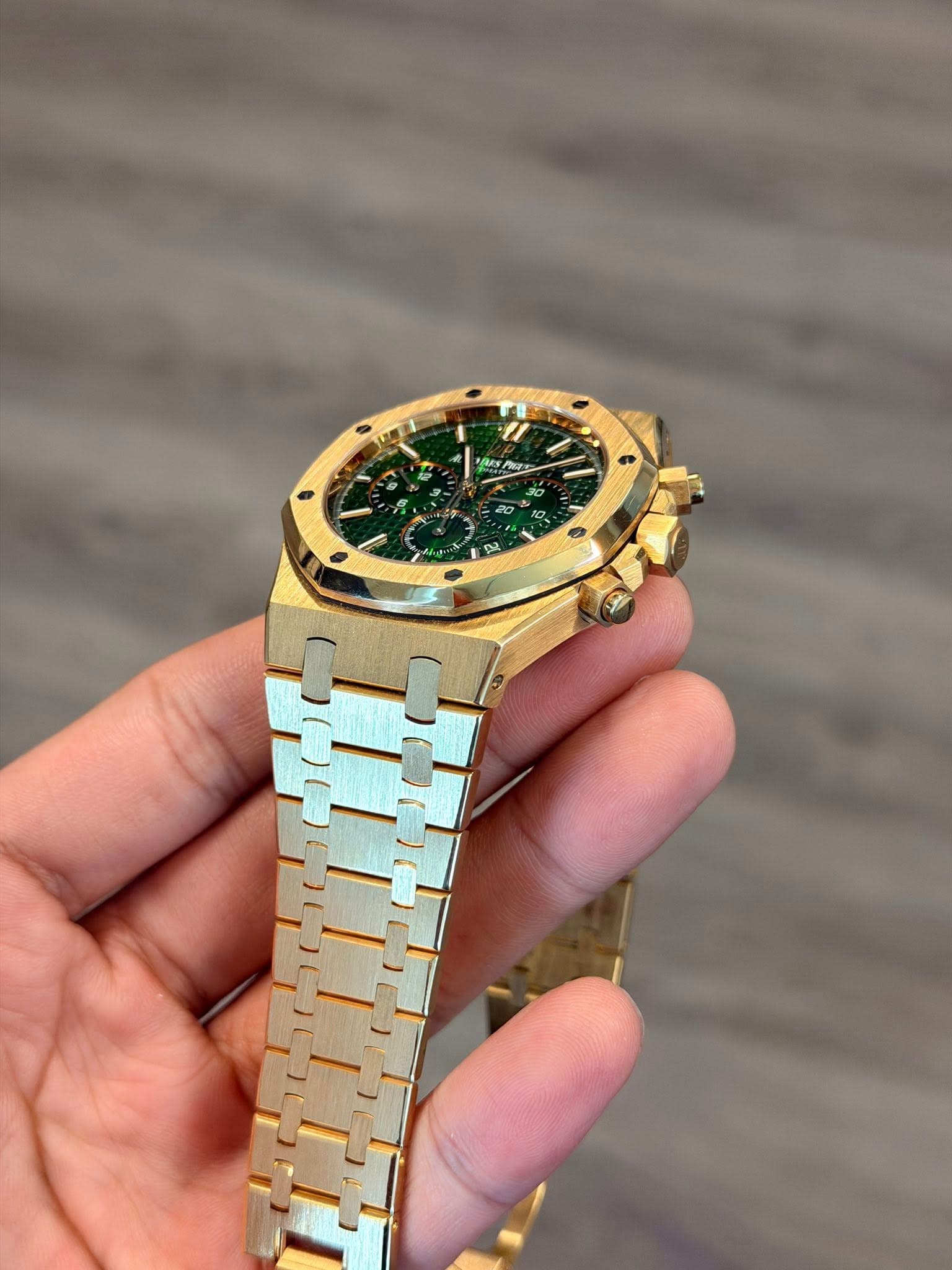 May be an image of wrist watch and text