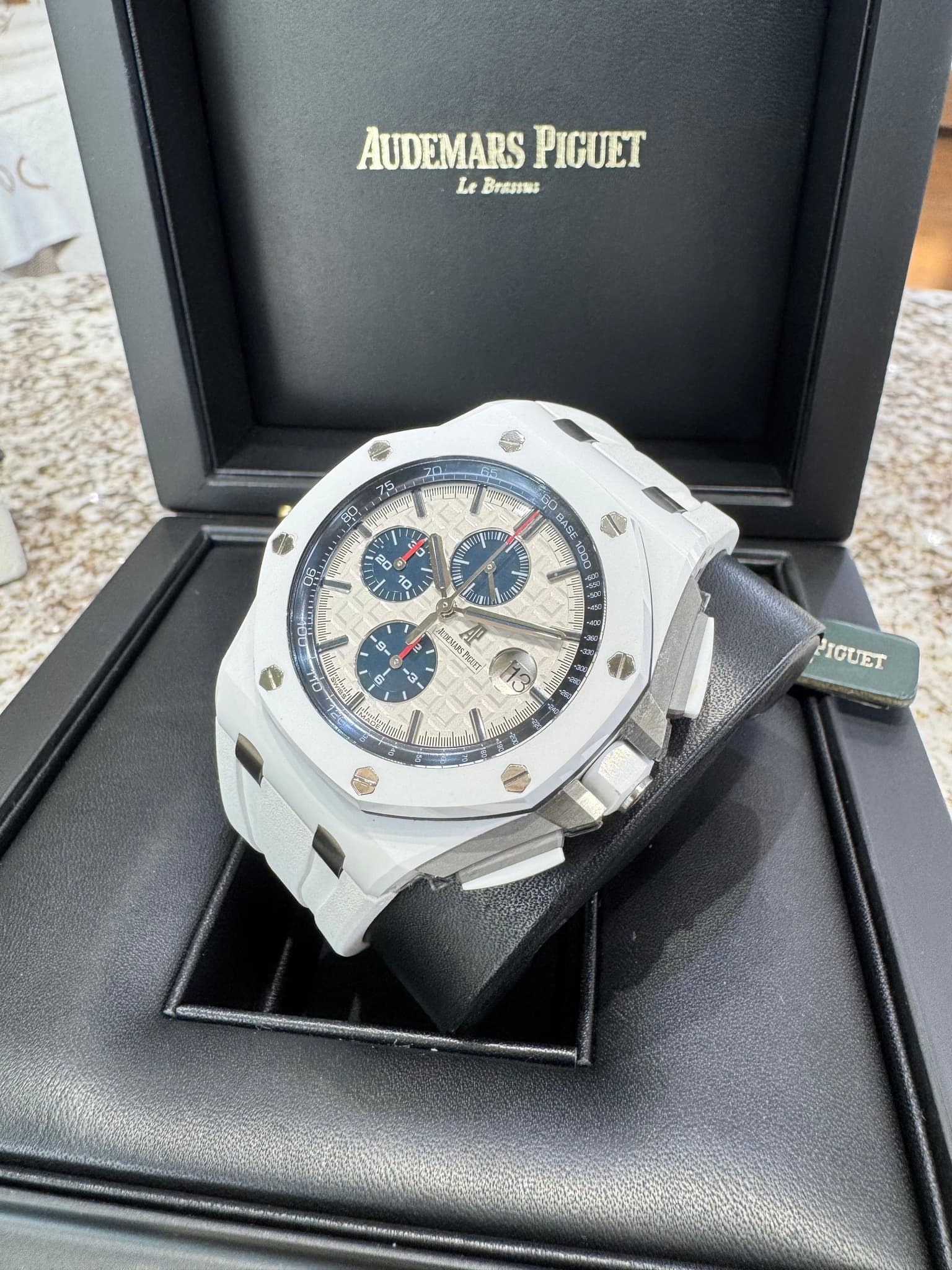 May be an image of wrist watch and text