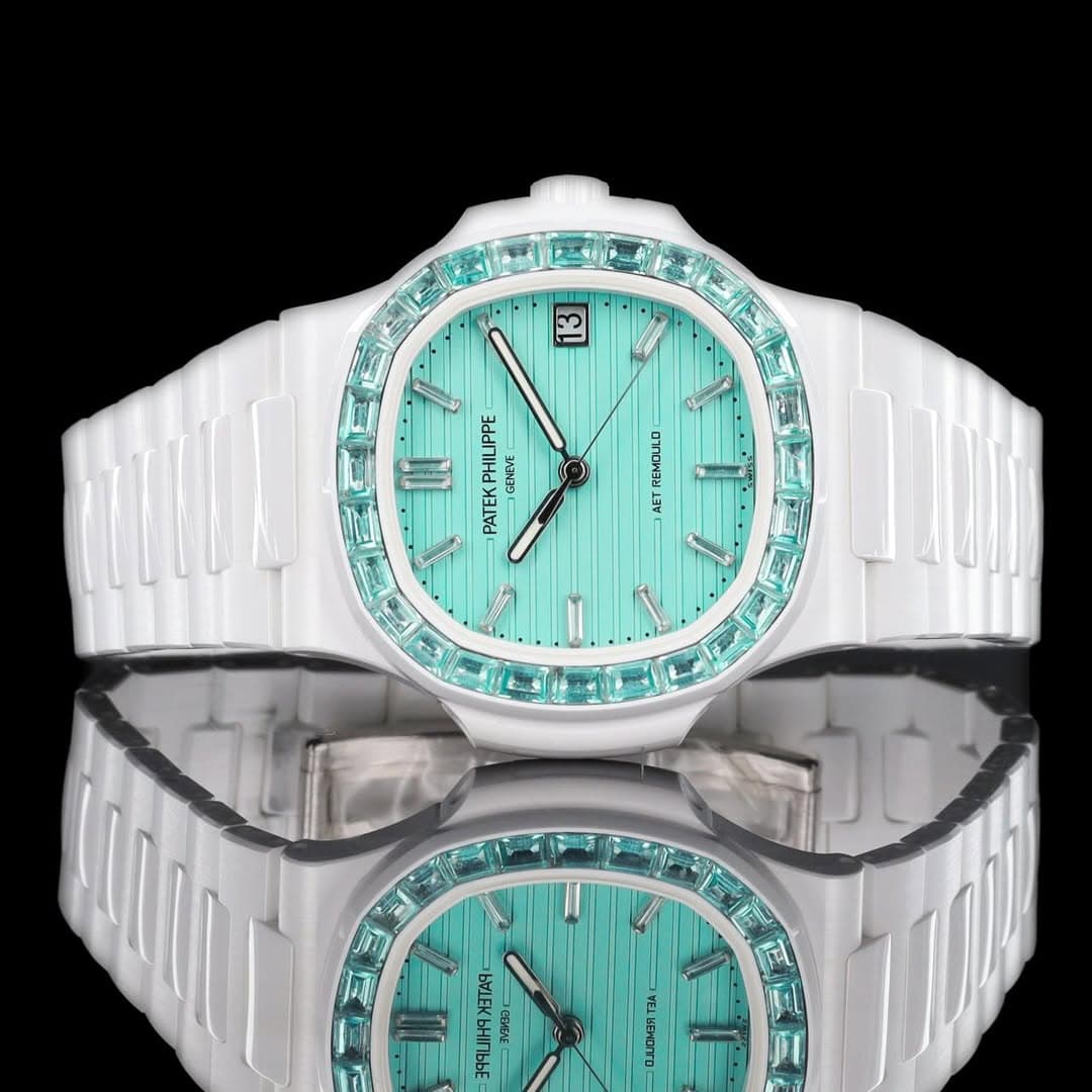 May be an image of wrist watch and text that says 'F3 Idd LIPPE PHIL 製 GENEVE PATEK ฉากฉพลย TTY 0 HI NI 199 X3TAR 1333 VEA M UENDITO KENDOTO'