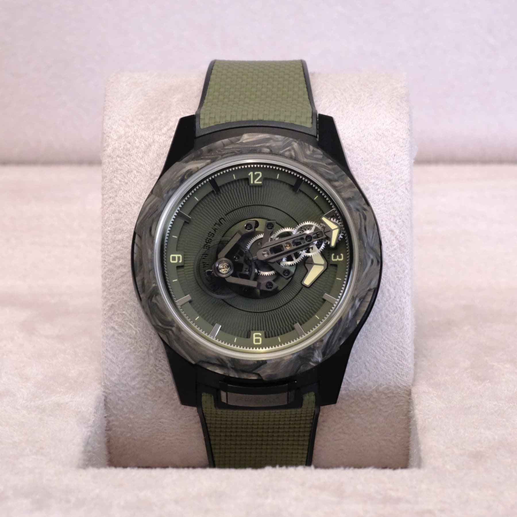 May be an image of wrist watch and text
