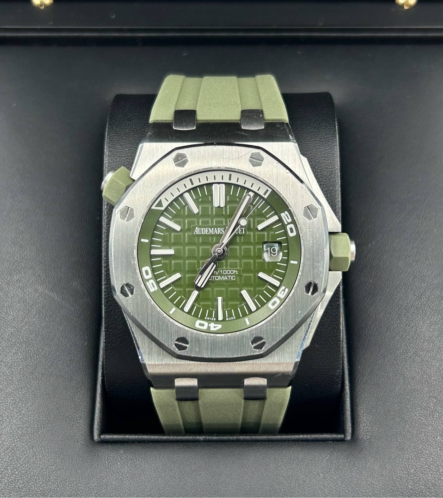 May be an image of wrist watch and text