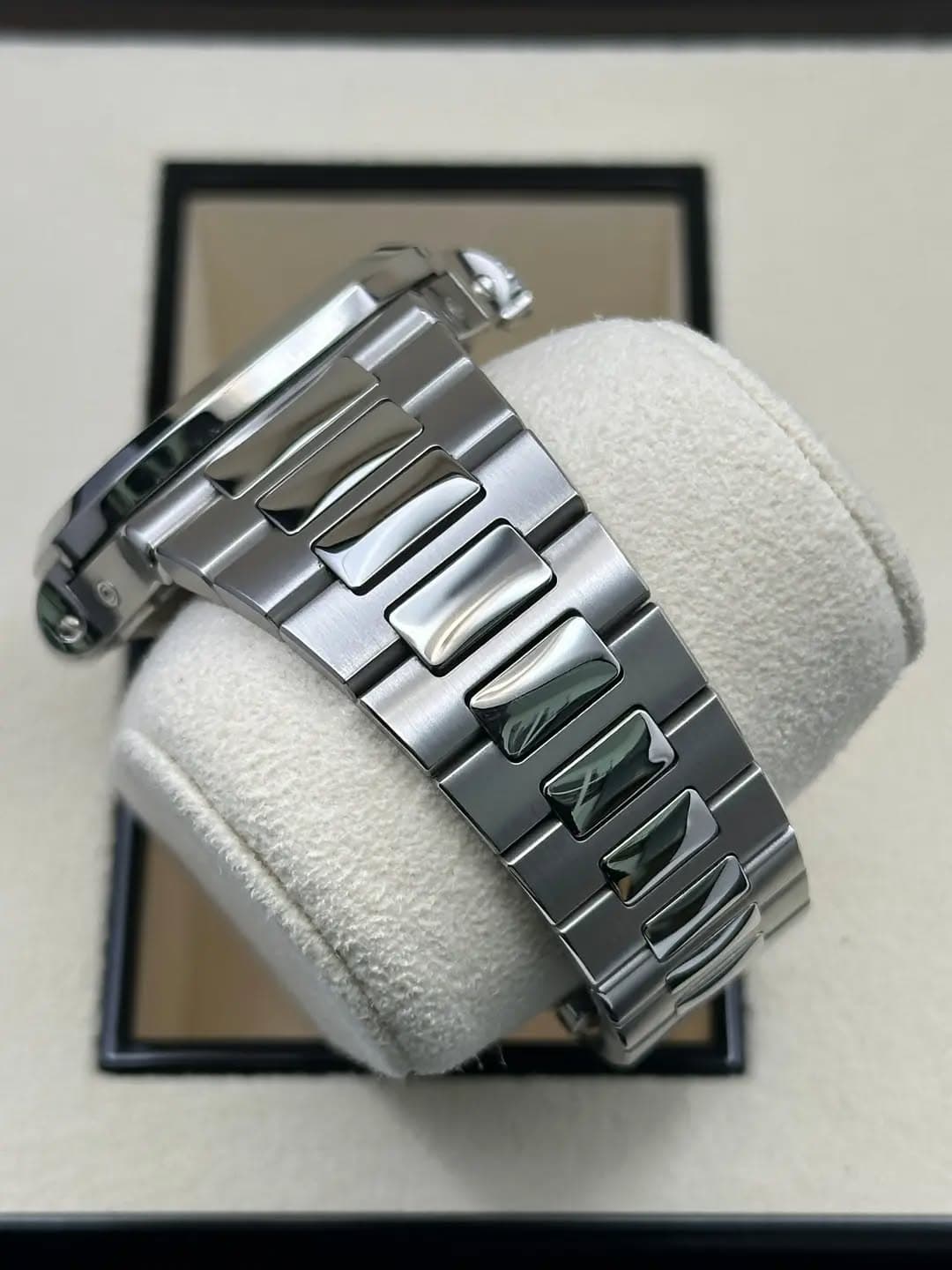 May be an image of jewelry, wrist watch and text