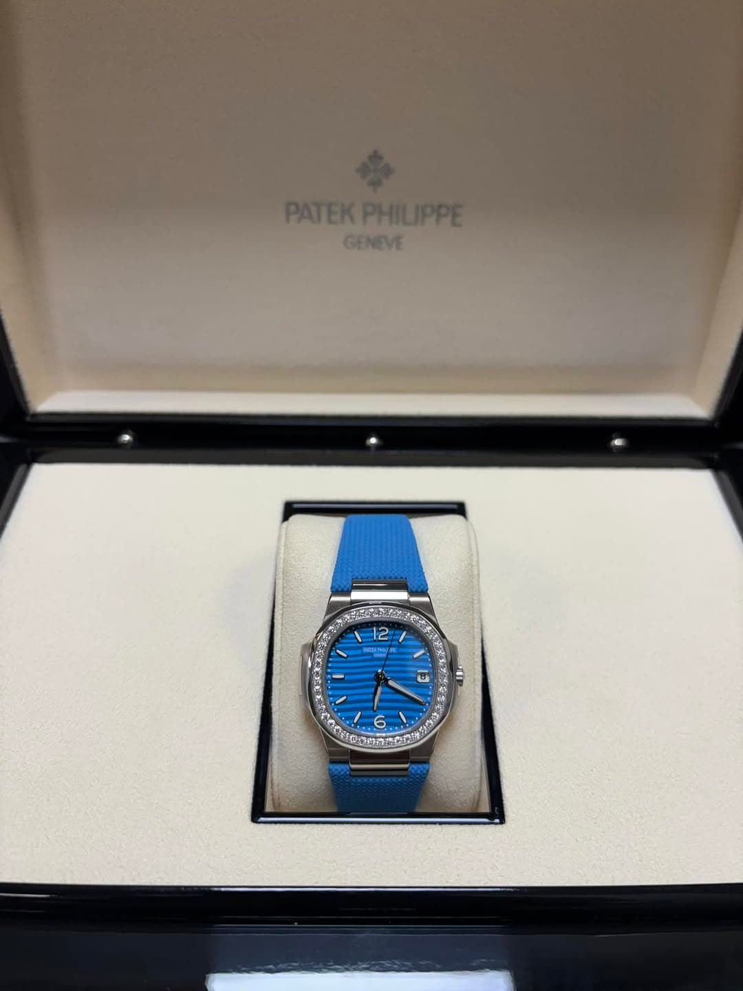 May be an image of wrist watch and text