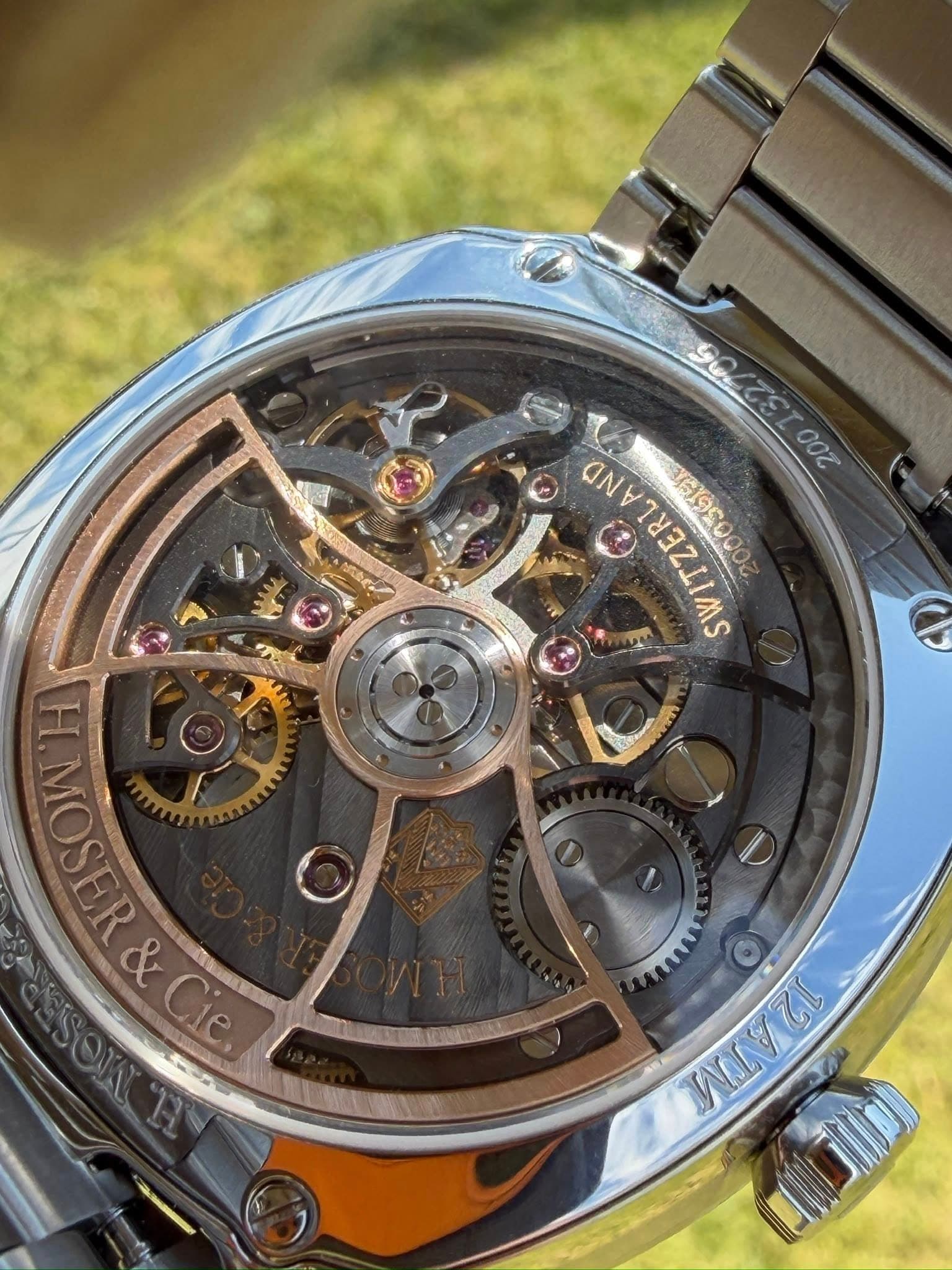 May be an image of wrist watch and text