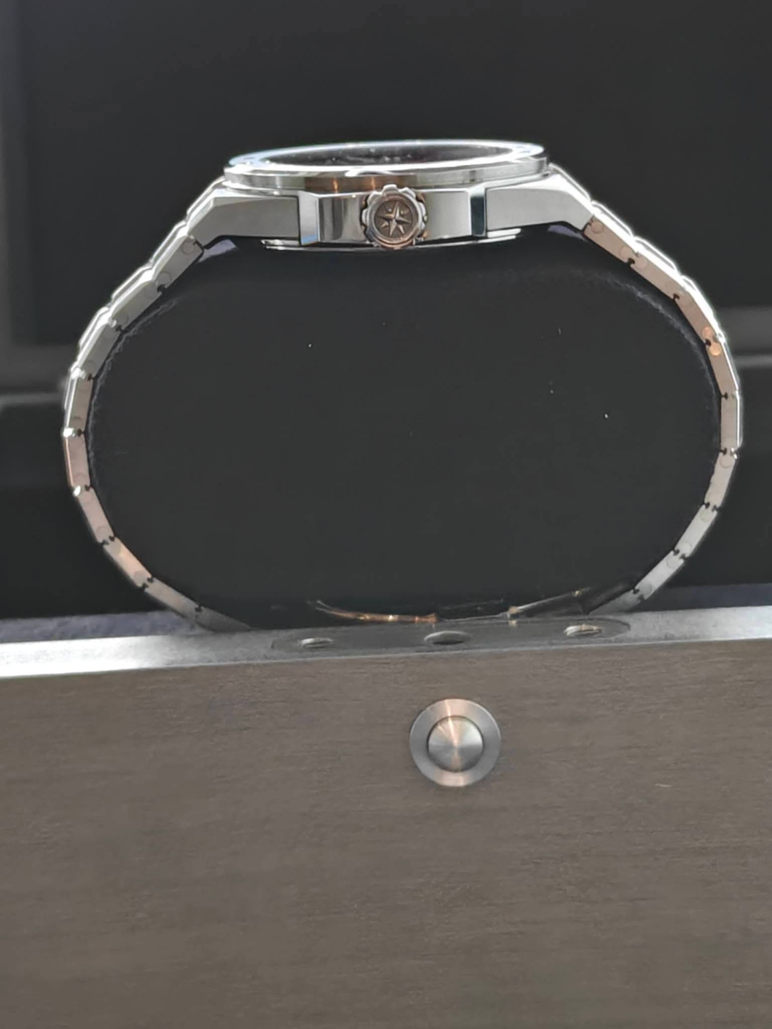 May be an image of wrist watch and jewelry