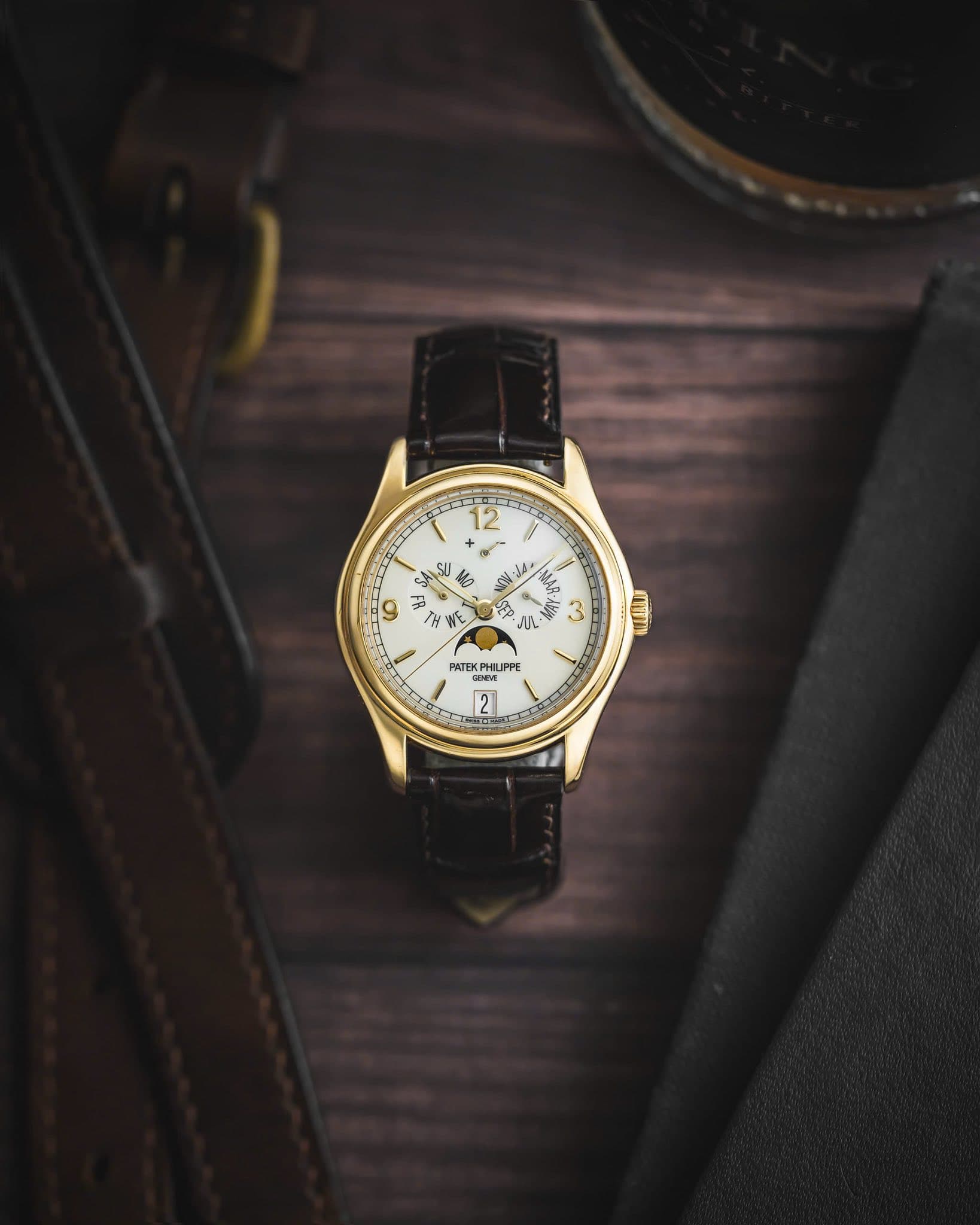 May be an image of wrist watch and text that says '12 ® ۱ور SU سی S و 비B A W WE HA ه NON רת MARAM ب PATEK PHILIPPE QAUJAN 2'