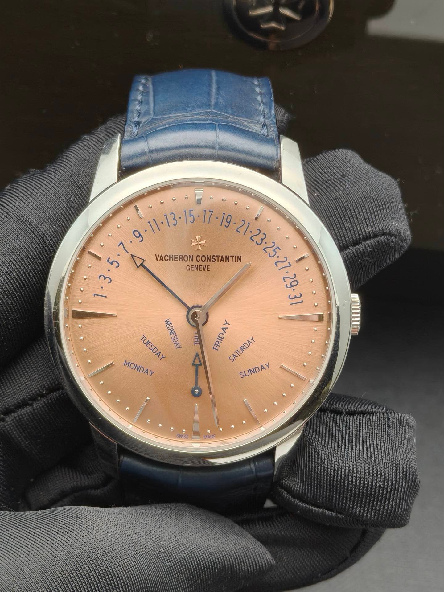 May be an image of wrist watch and text