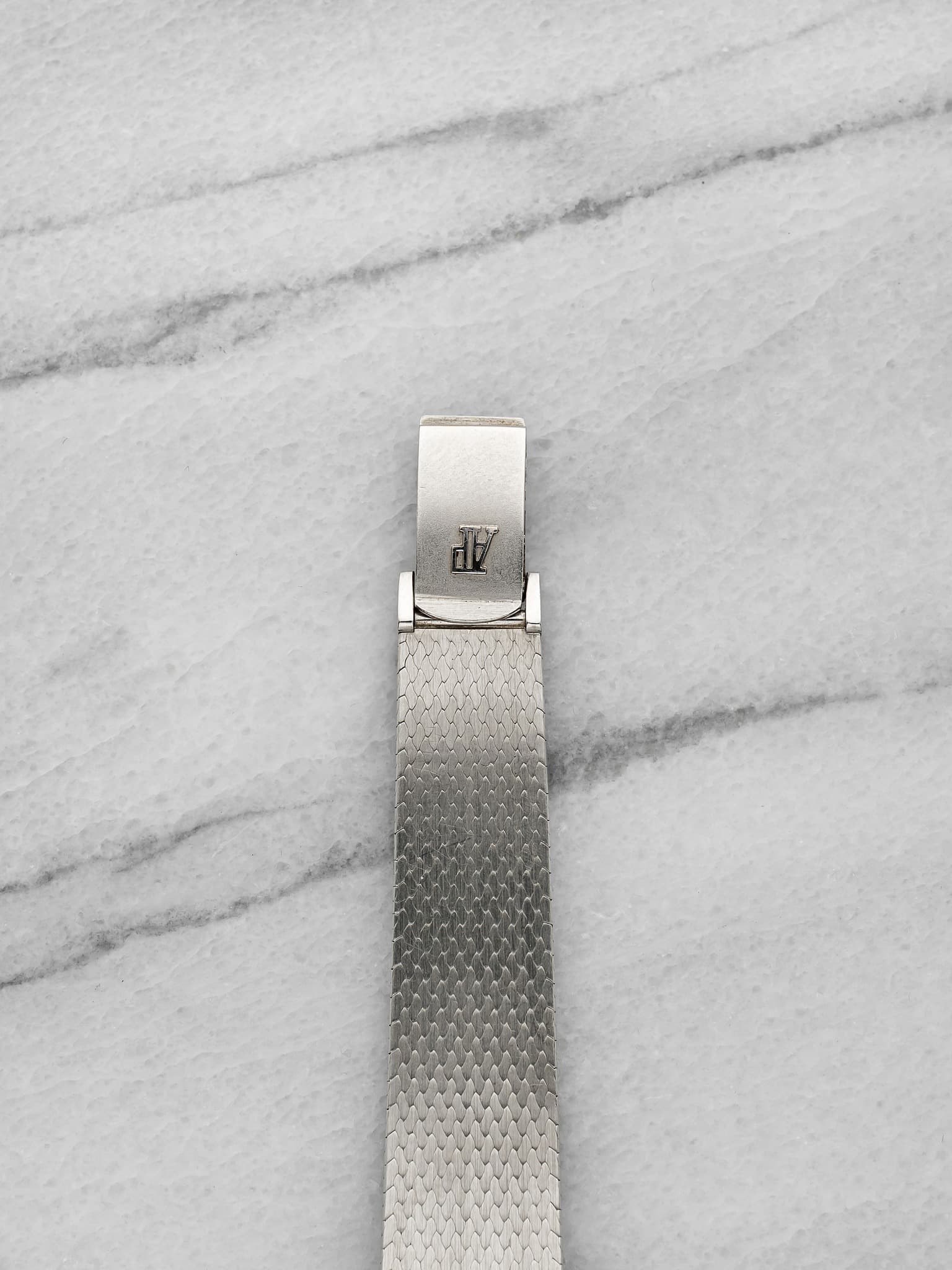 May be an image of jewelry and wrist watch