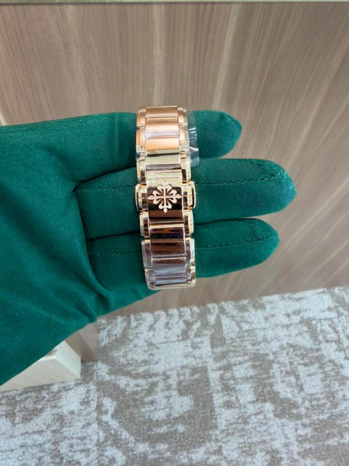 May be an image of jewelry and wrist watch