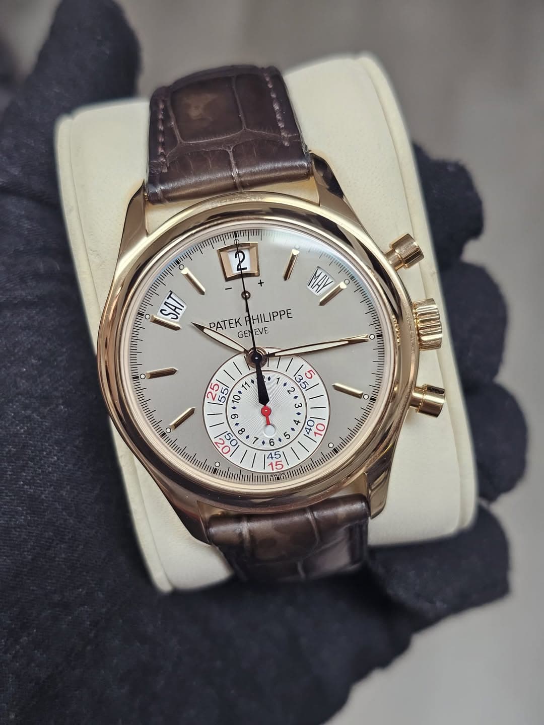 May be an image of wrist watch and text