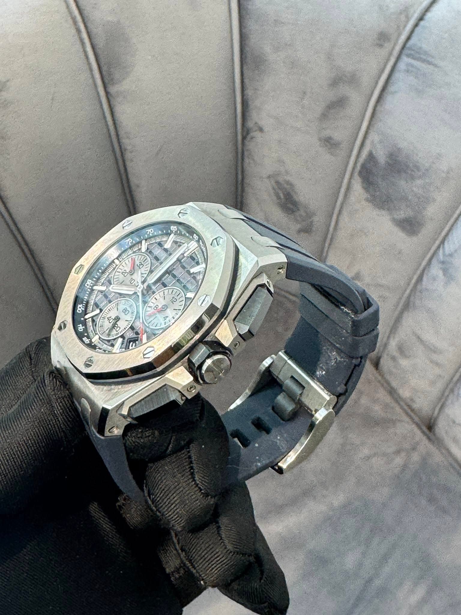 May be an image of wrist watch and text