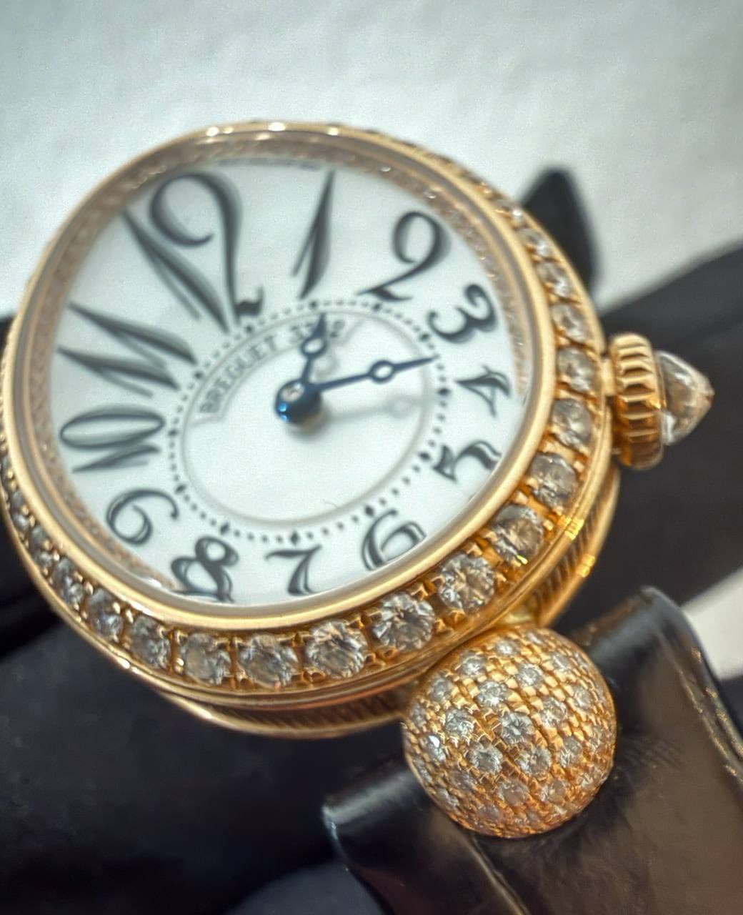 May be an image of wrist watch and text that says '23 2 می B า 6 68'