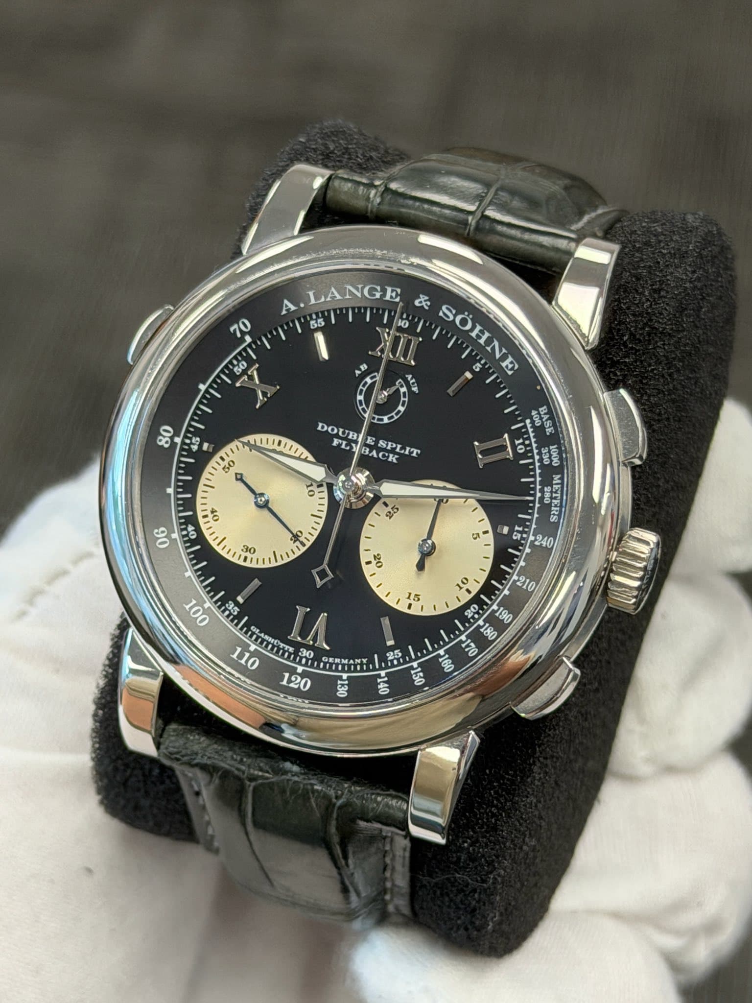 May be an image of wrist watch and text