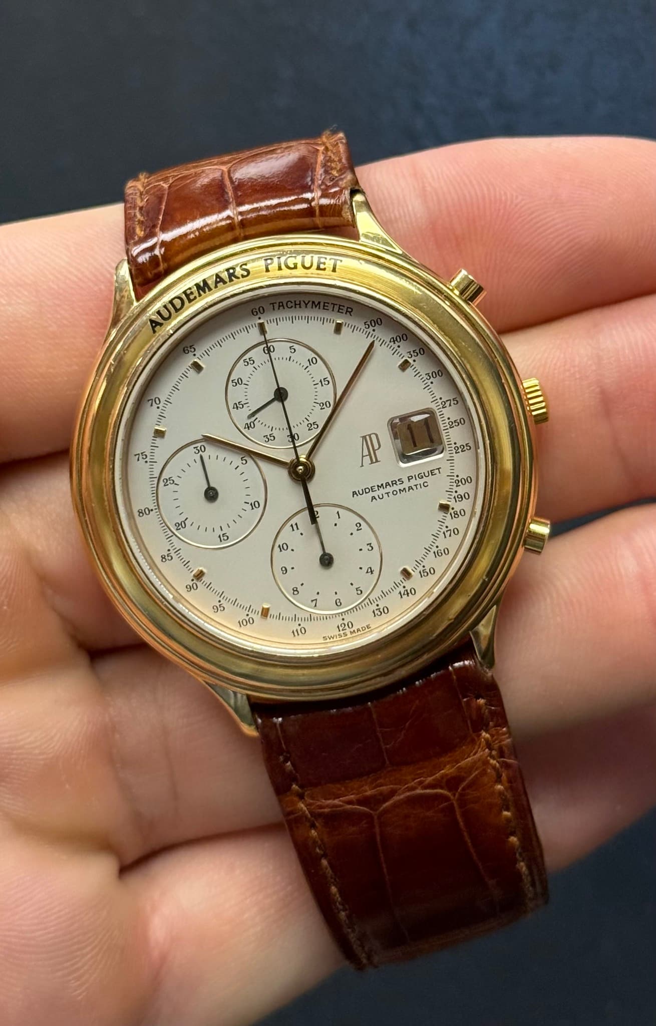 May be an image of wrist watch and text