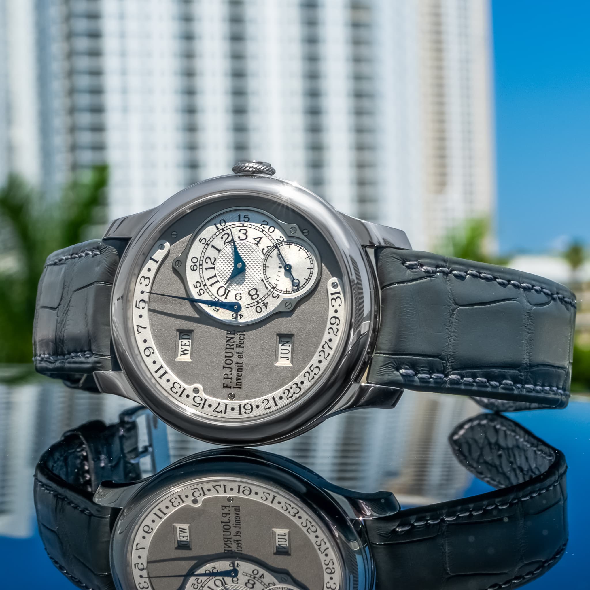 May be an image of wrist watch and text