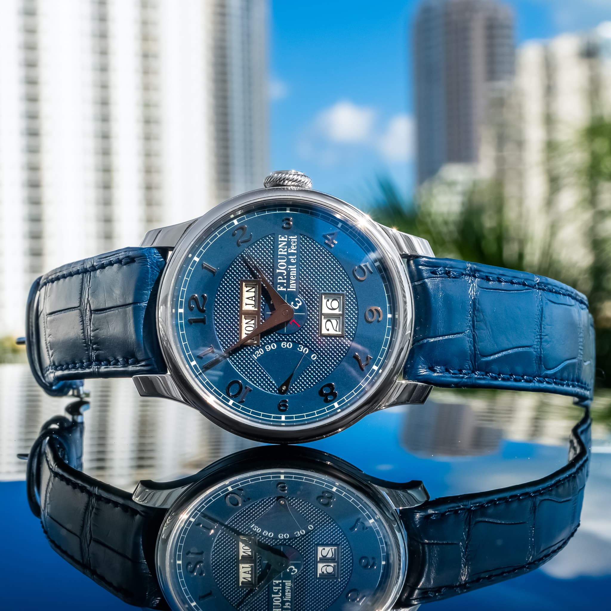 May be an image of wrist watch and text
