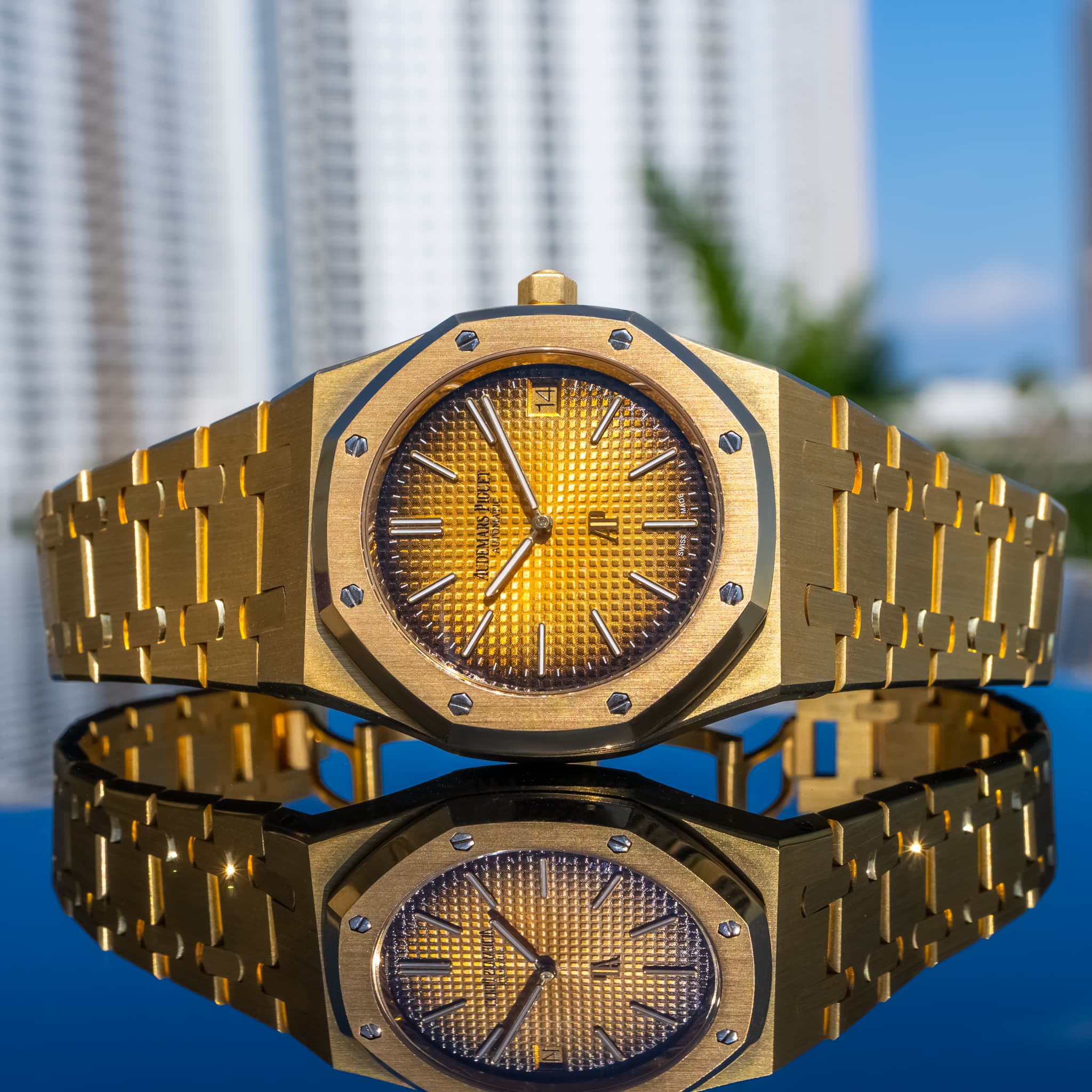 May be an image of wrist watch and text