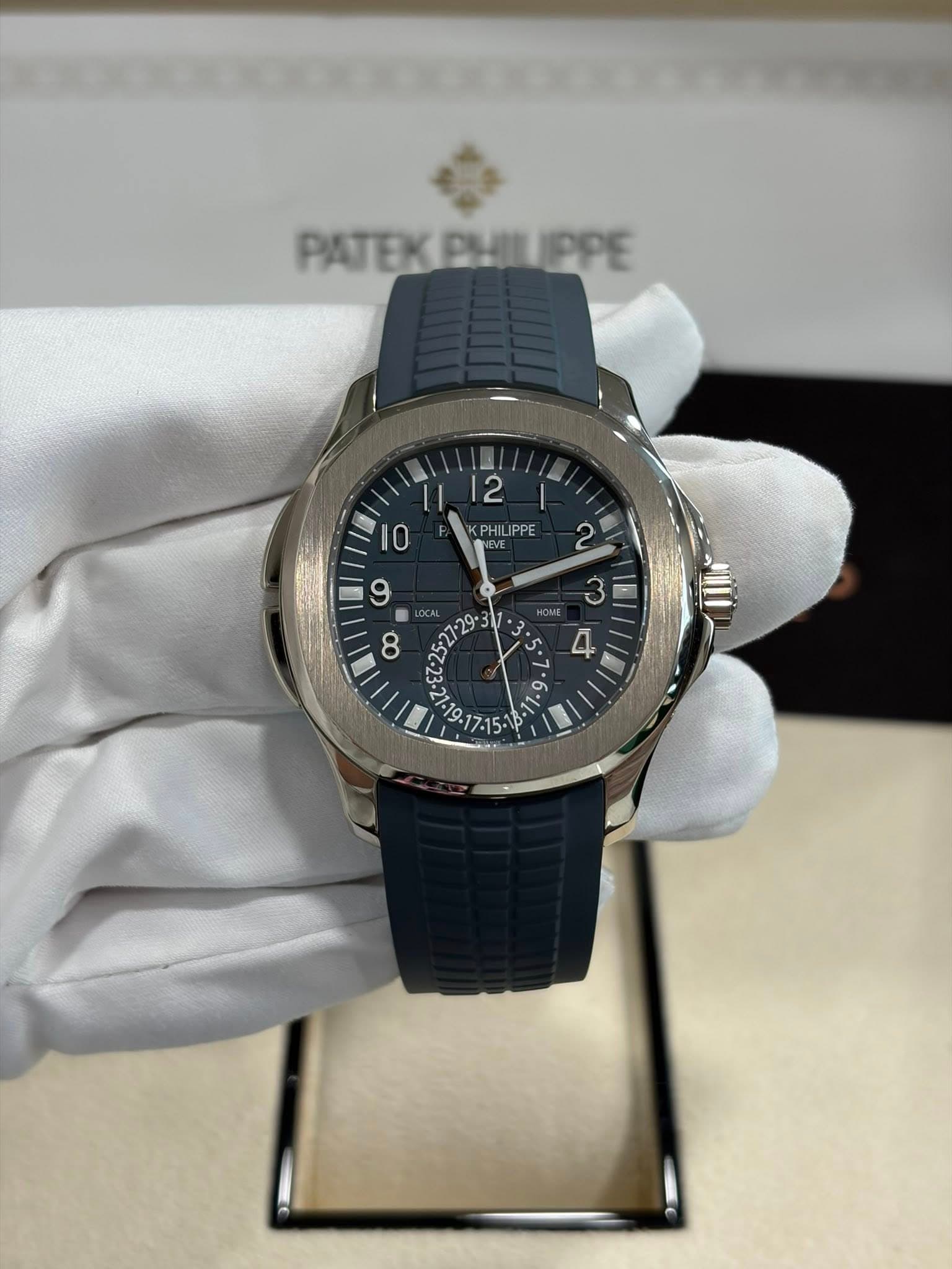 May be an image of wrist watch and text that says 'PATEKBHILIPPE PHII PATEK PHLPPE 2 PHILIPPE PHIL PPE 10 三 9 2 3 4 III '
