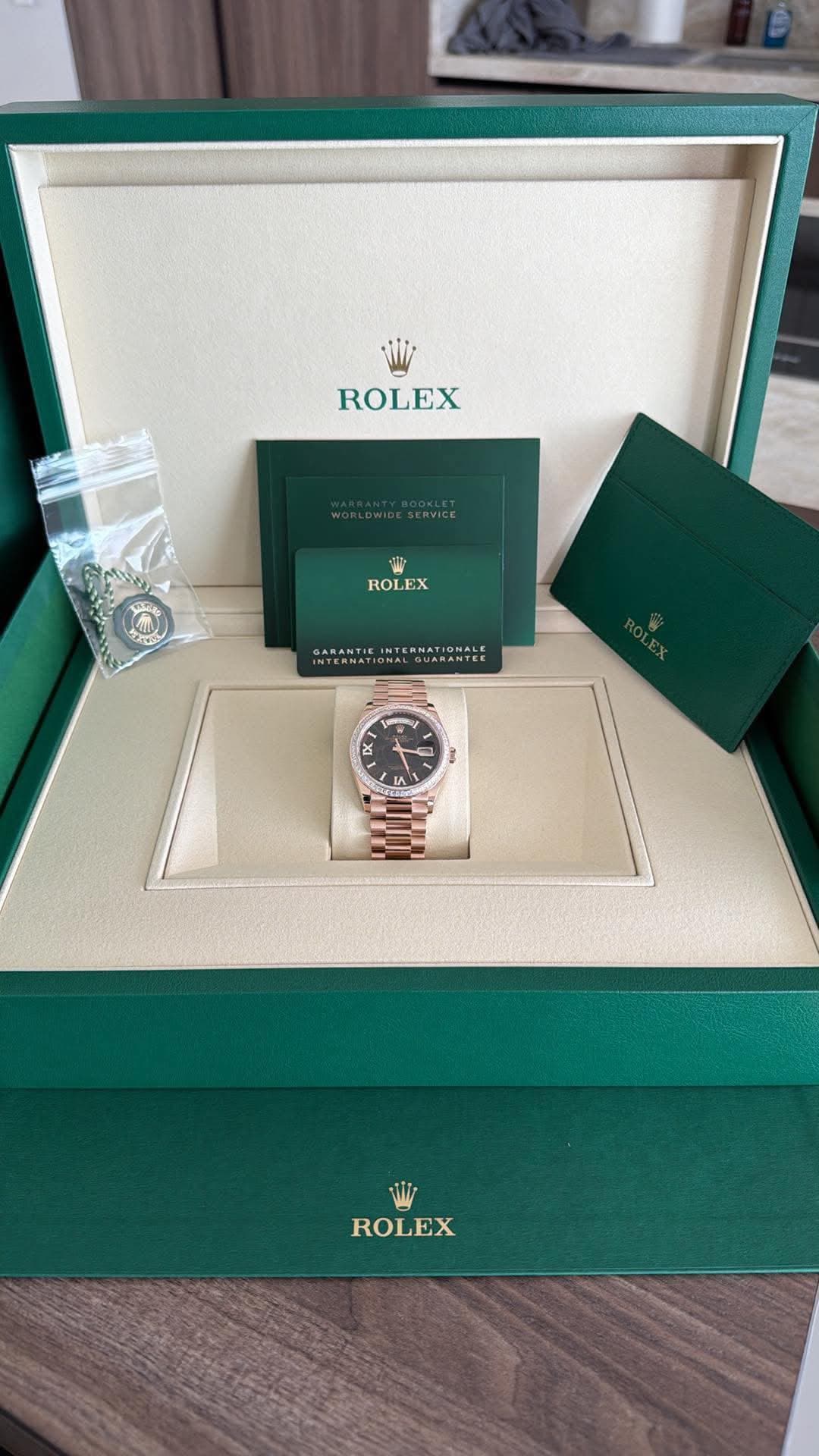 May be an image of wrist watch and text