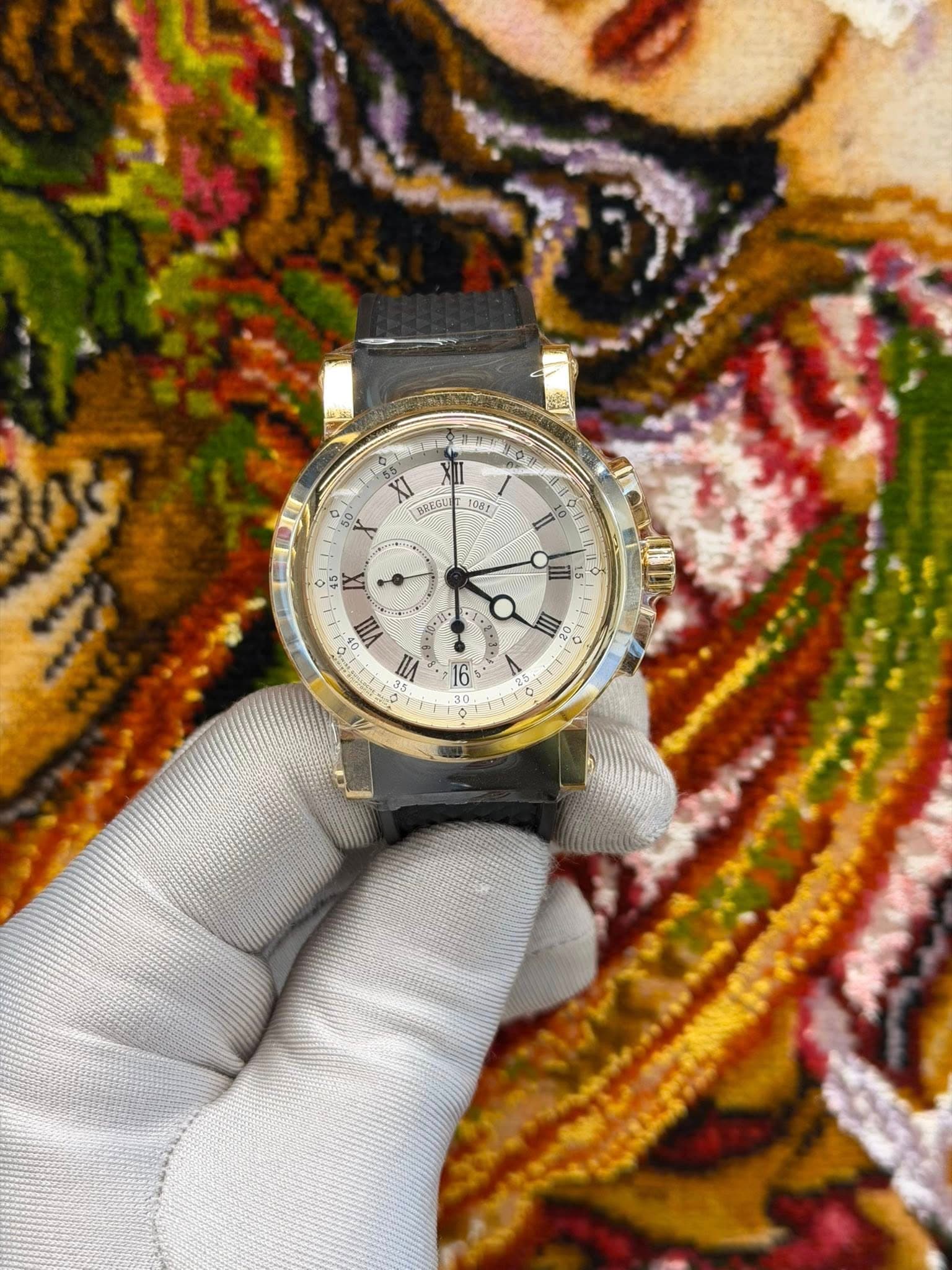 May be an image of wrist watch and text that says 'Me St ំ XI BREGU 50 I 1아17 I o 1 45 IX 2 ١٠ ١٠ VIII W E Po 7 H D'