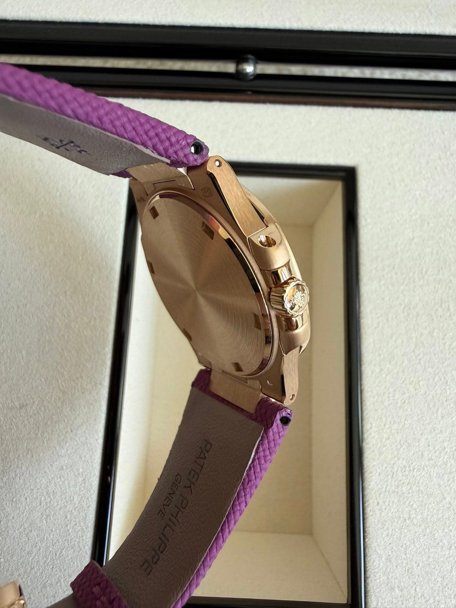 May be an image of wrist watch and text