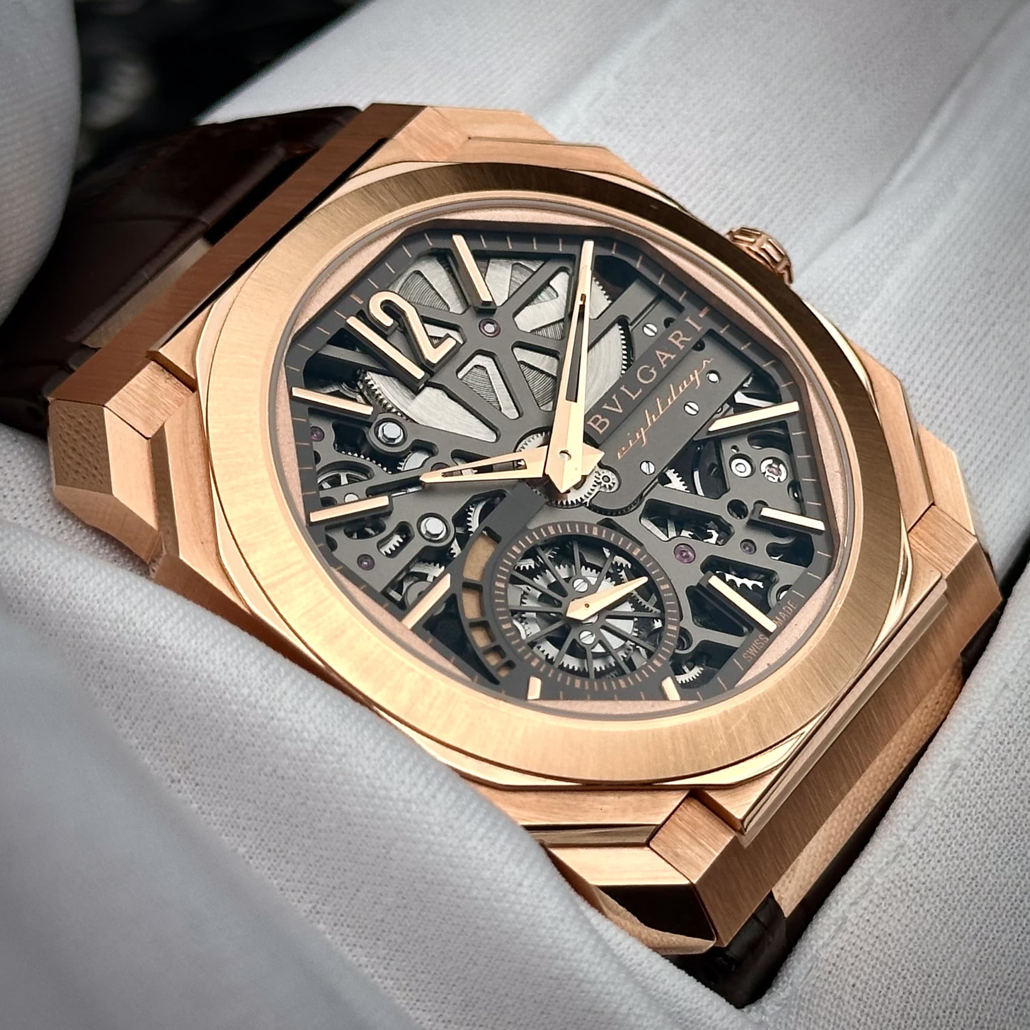 May be an image of wrist watch and text