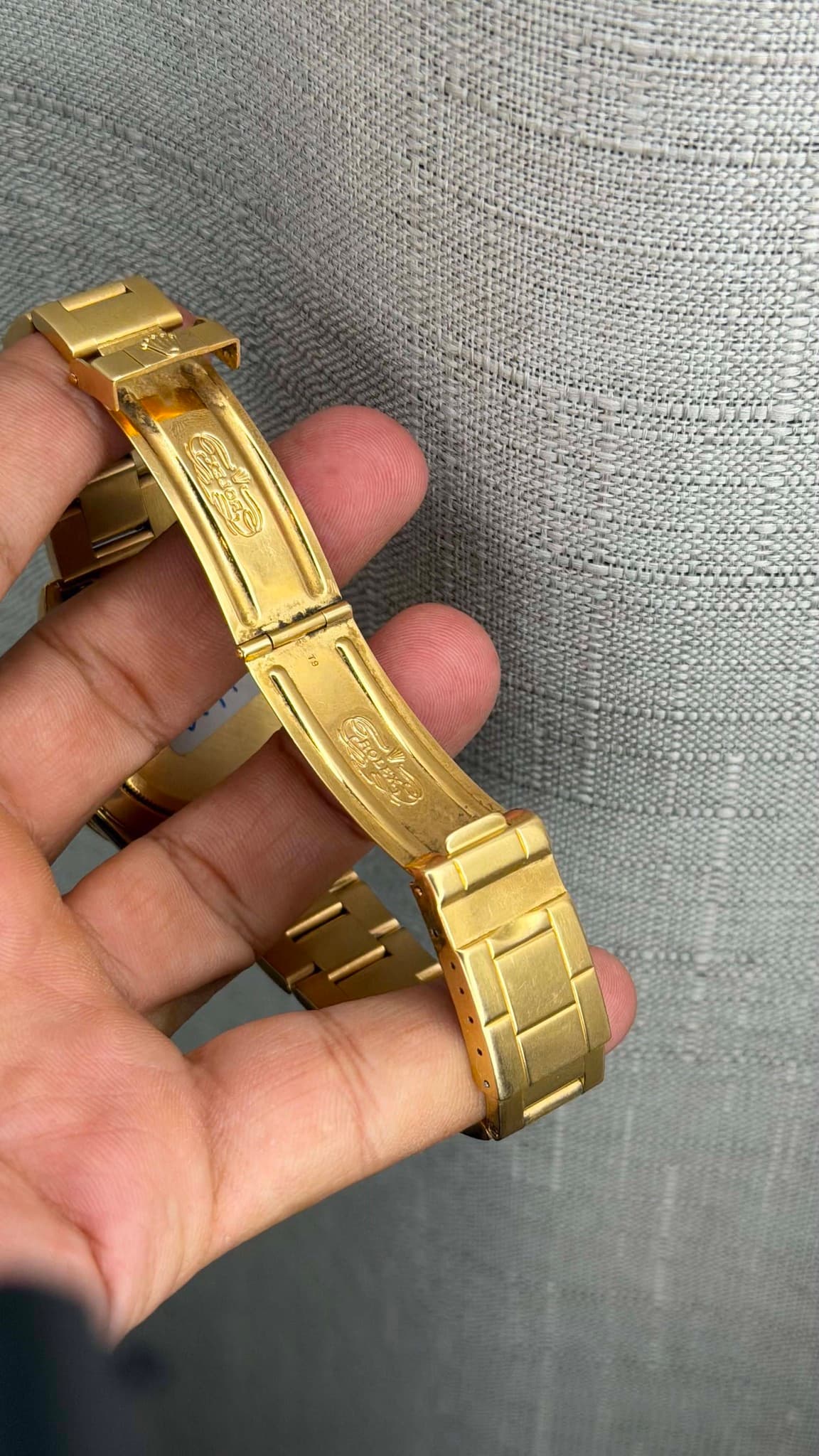 May be an image of wrist watch and text