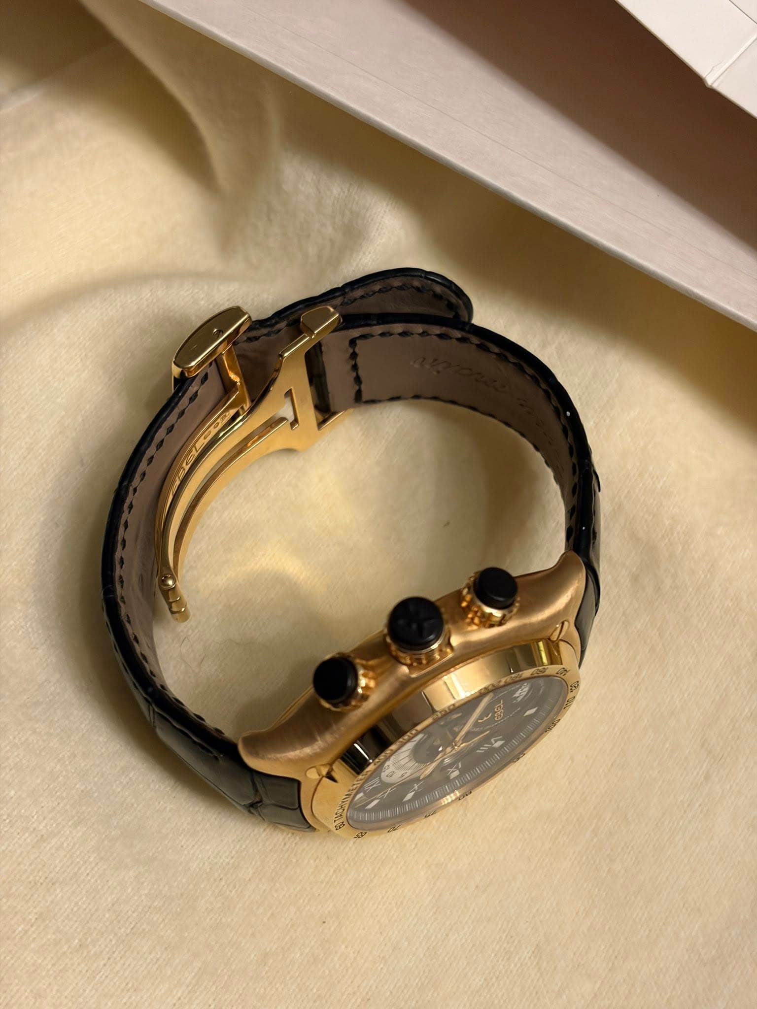 May be an image of wrist watch
