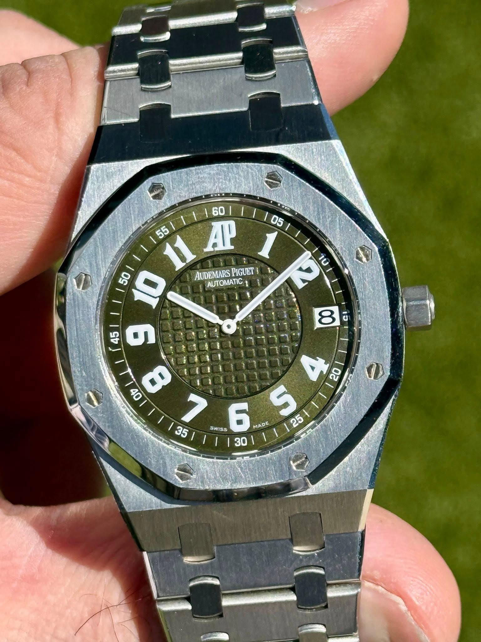 May be an image of wrist watch and text that says ' AP 1 50 10 AUDEMARS PIGUET , o0 8 7 S 25 35 JISS 6 MADE 30 8 כי'