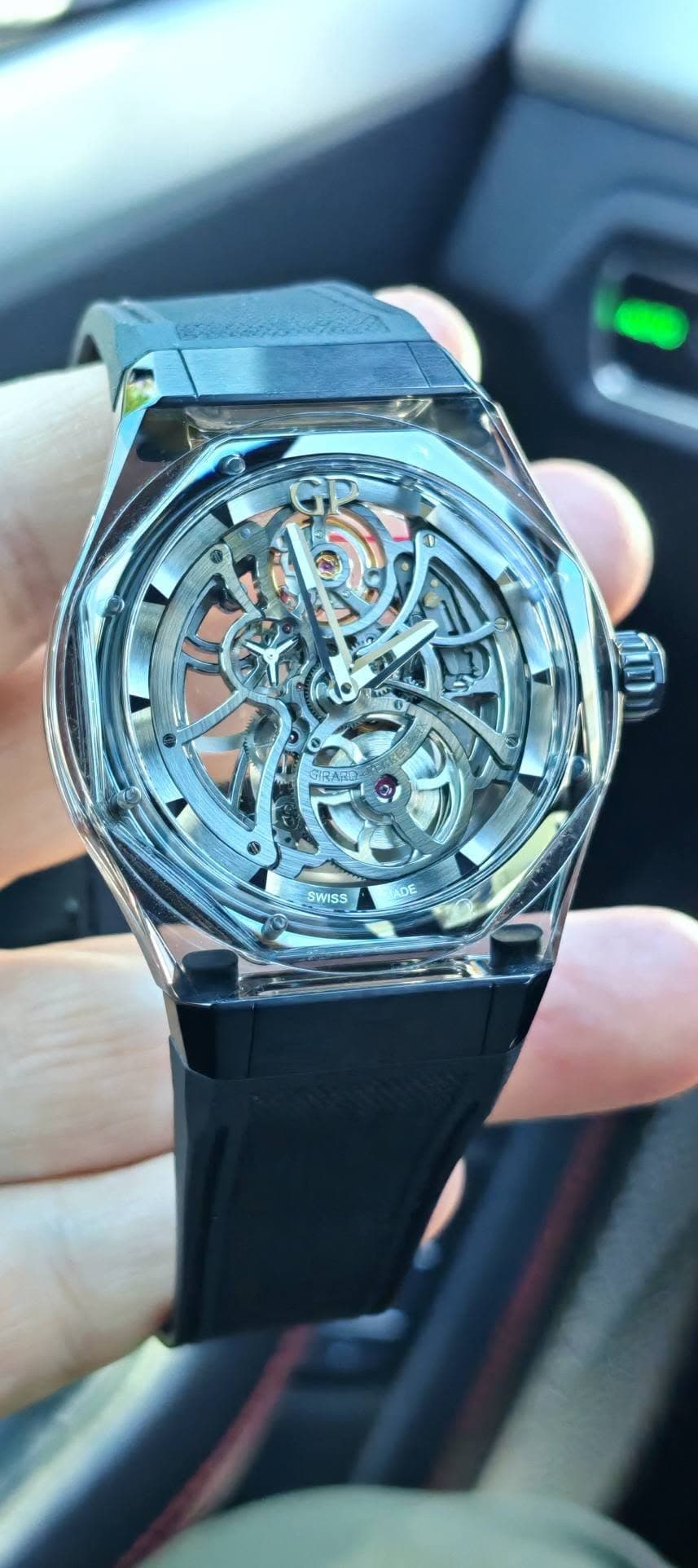May be an image of wrist watch and text that says 'กั חרך C NDE SWISS'