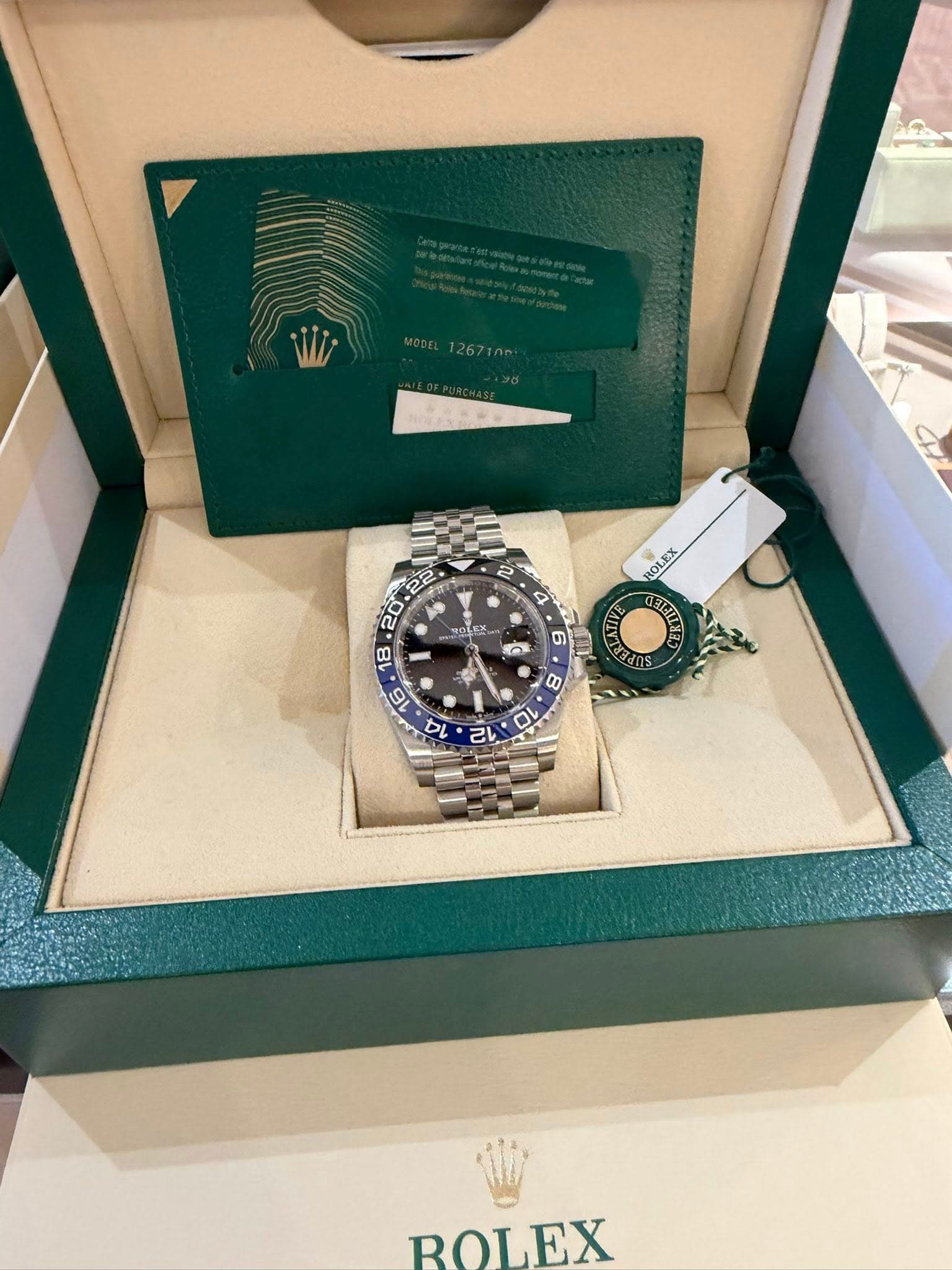May be an image of wrist watch and text