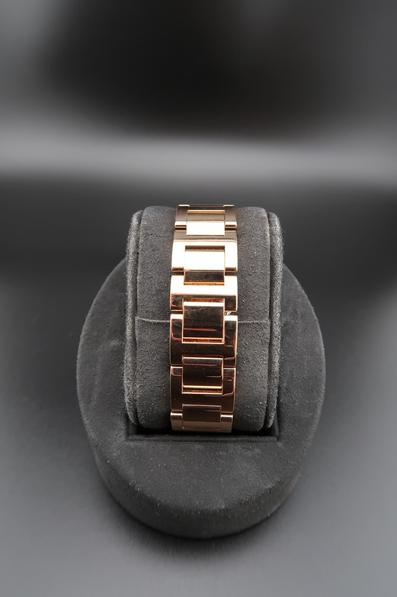May be an image of wrist watch and jewelry