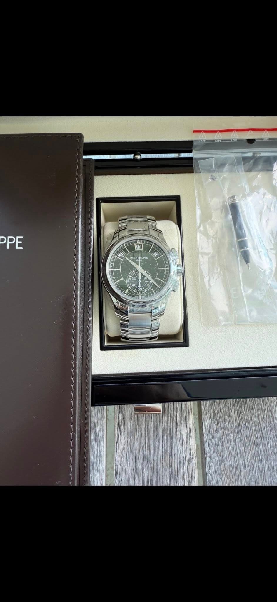 May be an image of wrist watch and text that says 'PPE ๅฝ'