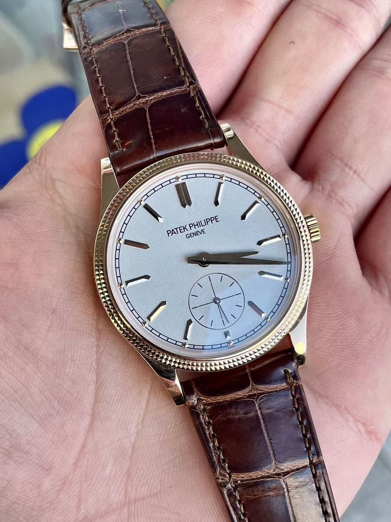 May be an image of wrist watch and text that says 'PATEK GENEVE PHILIPPE PATEKPHILIPPE E I'
