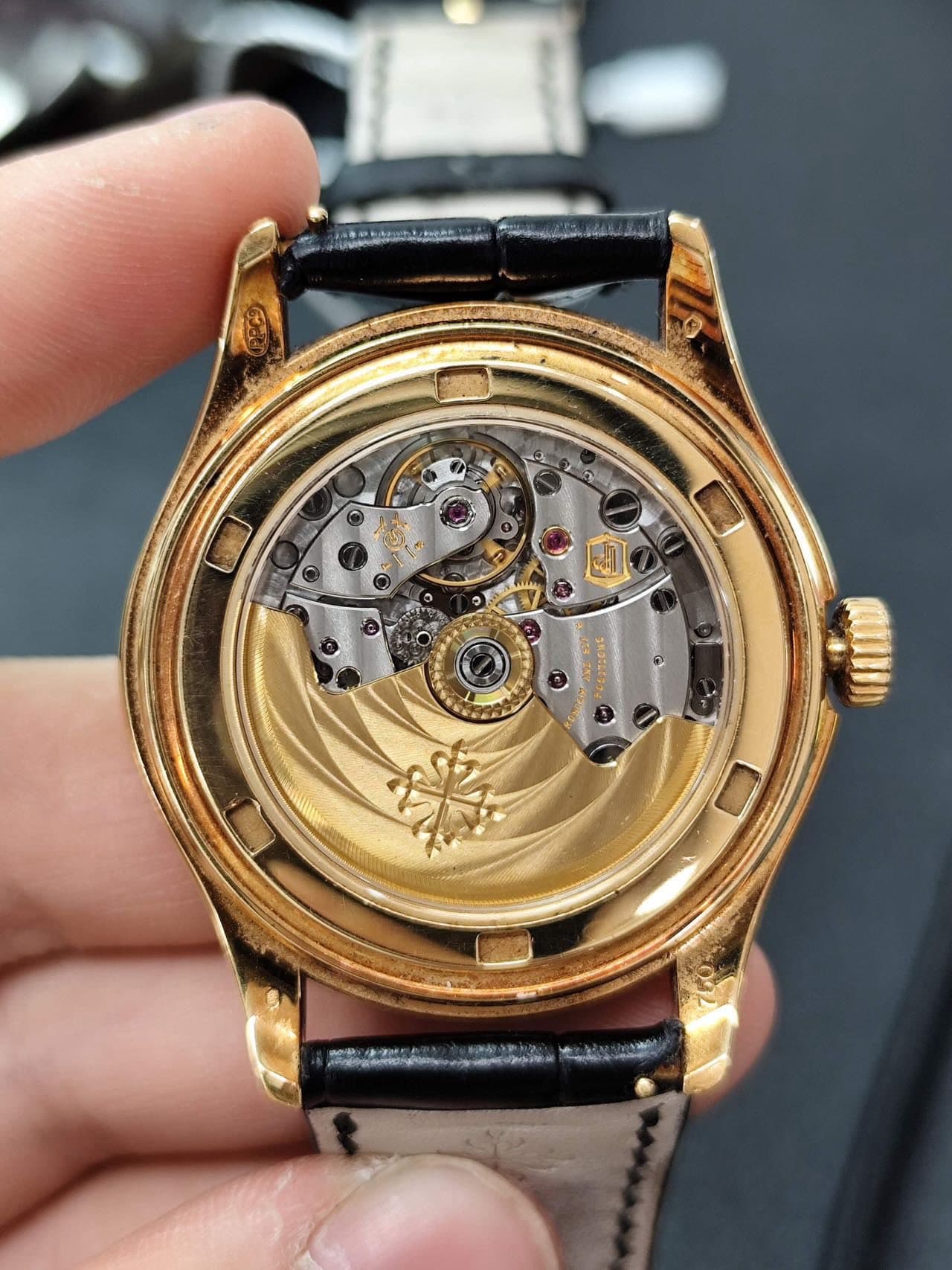 May be an image of wrist watch and text