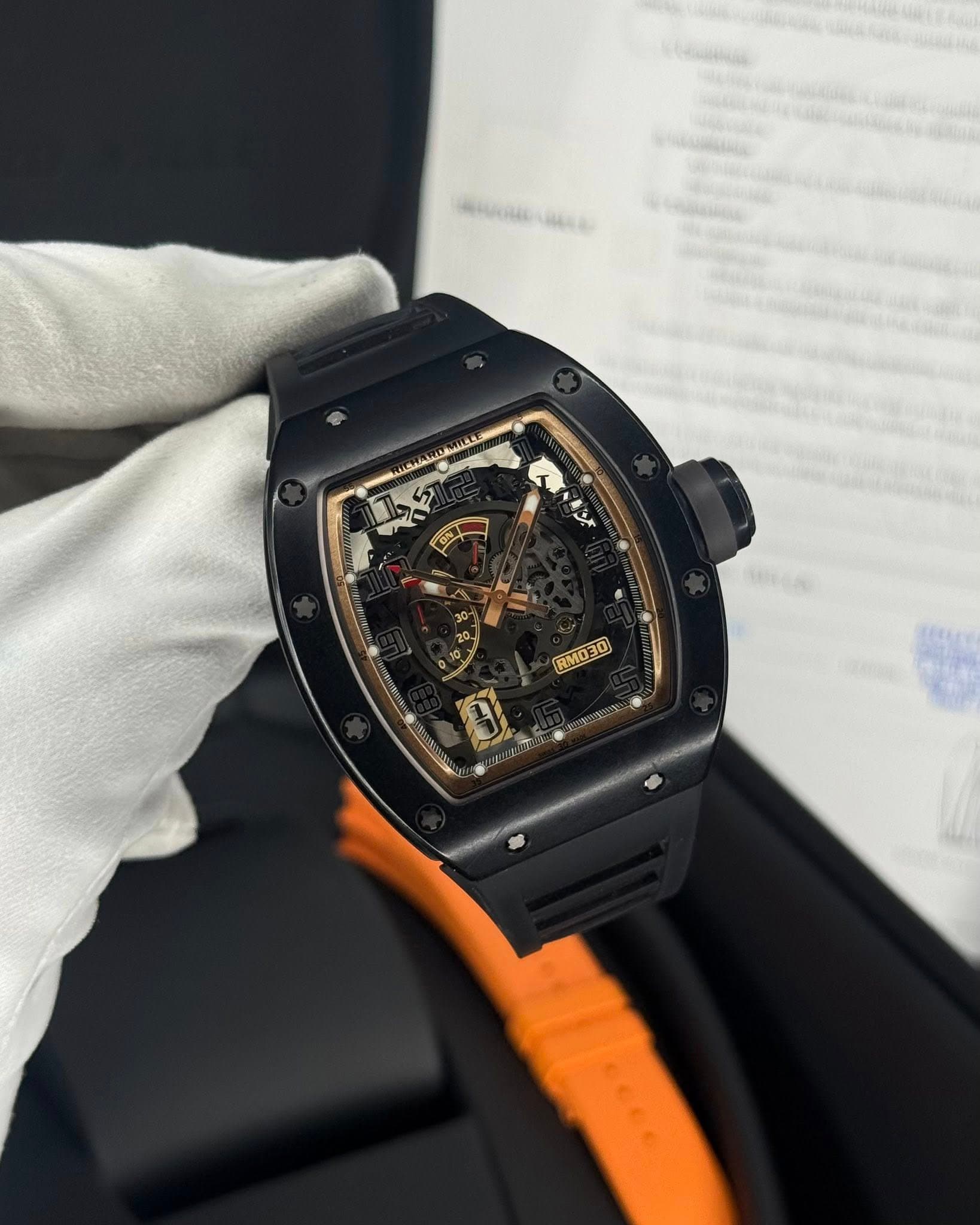 May be an image of wrist watch and text
