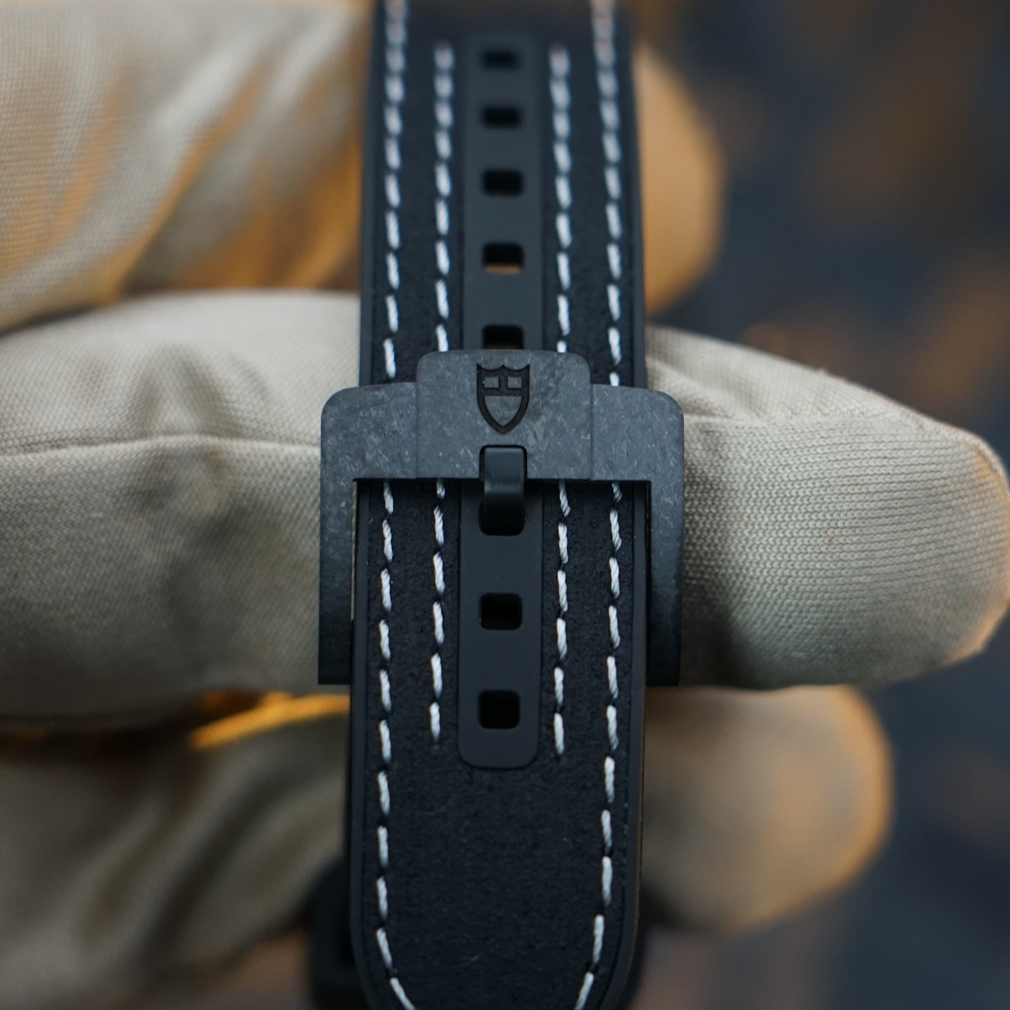 May be an image of leather, saddle-stitched leather and wrist watch