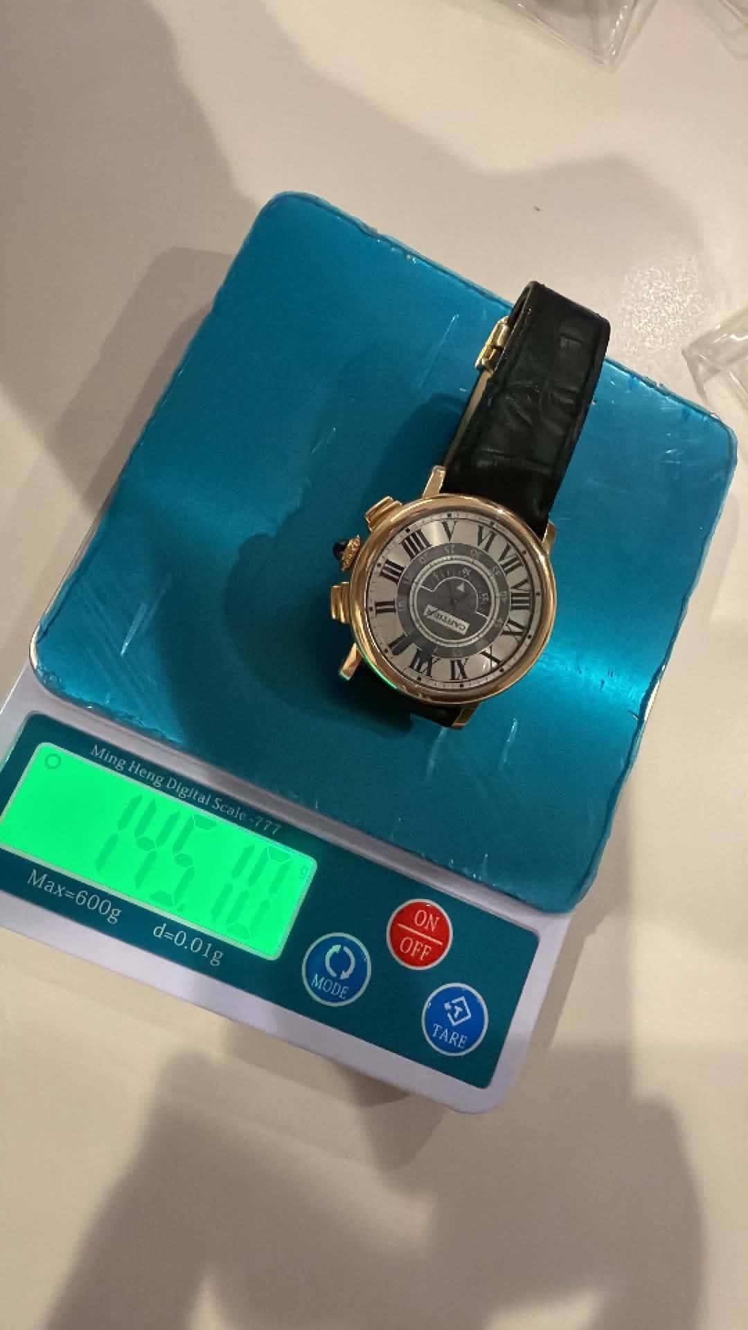 May be an image of digital watch and text that says 'VI VVII V VII oaarva MingHe Digita DigitalS Max= 600g Max=600g 145 eng d=0.01g d-0.01g 100 111 ON OFF T TARE'