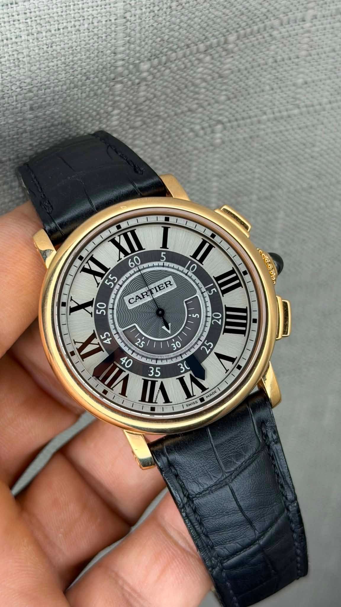 May be an image of wrist watch and text