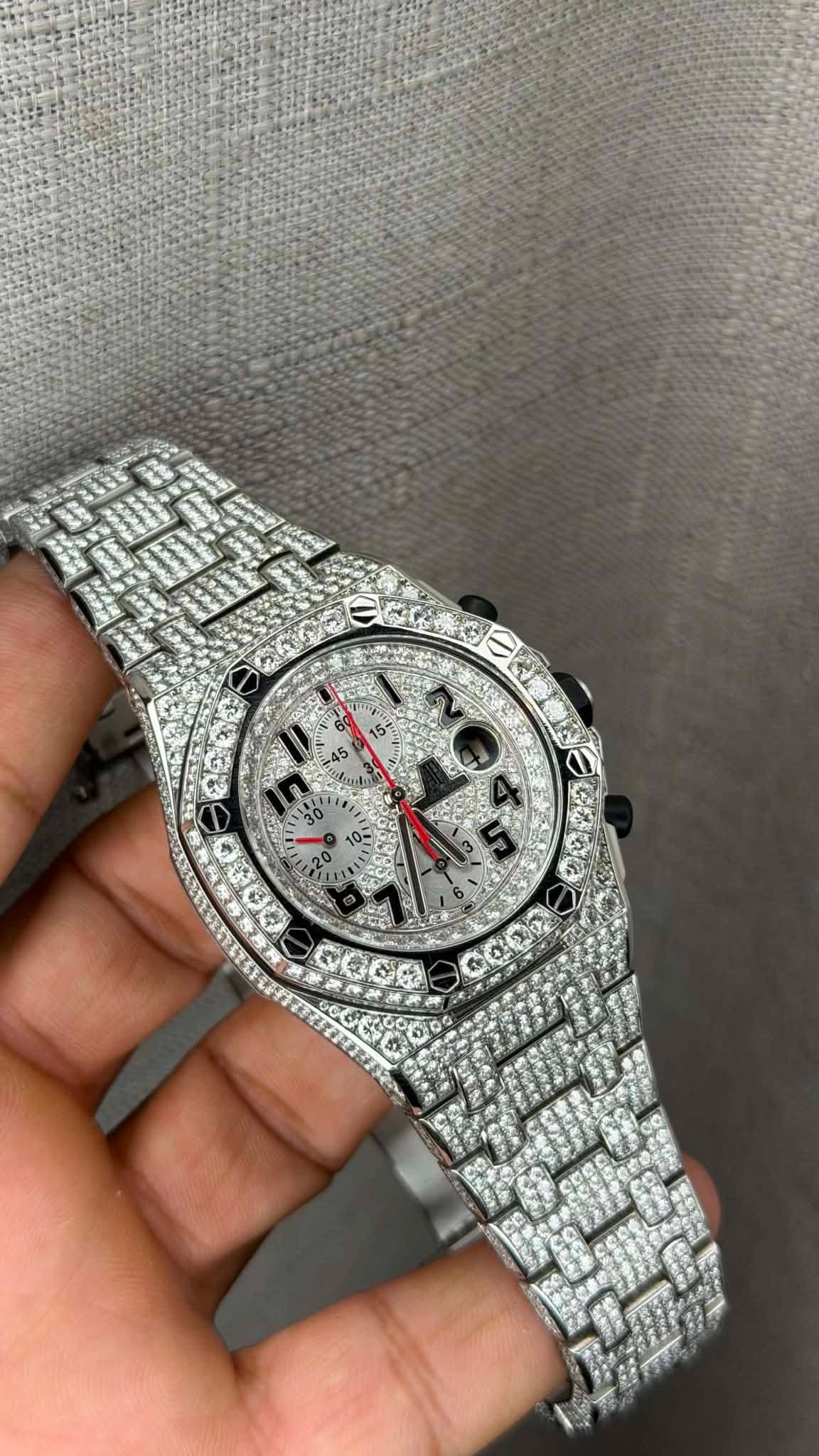 May be an image of wrist watch and text