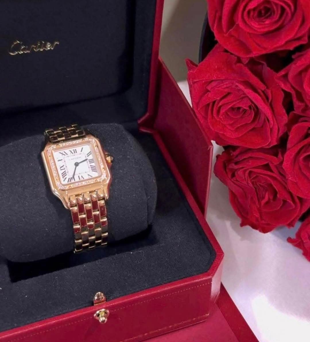 May be an image of wrist watch and text