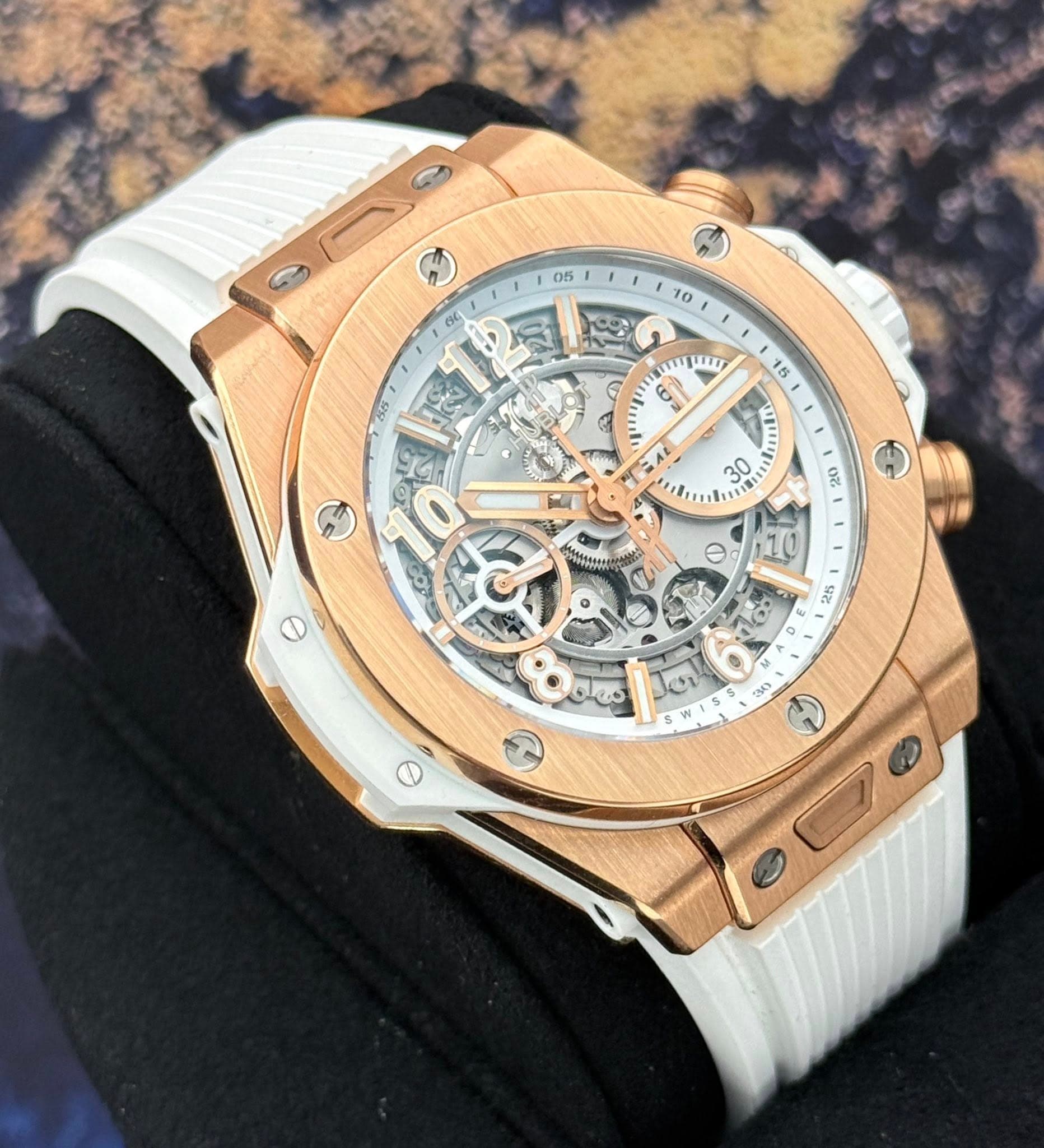 May be an image of wrist watch and text