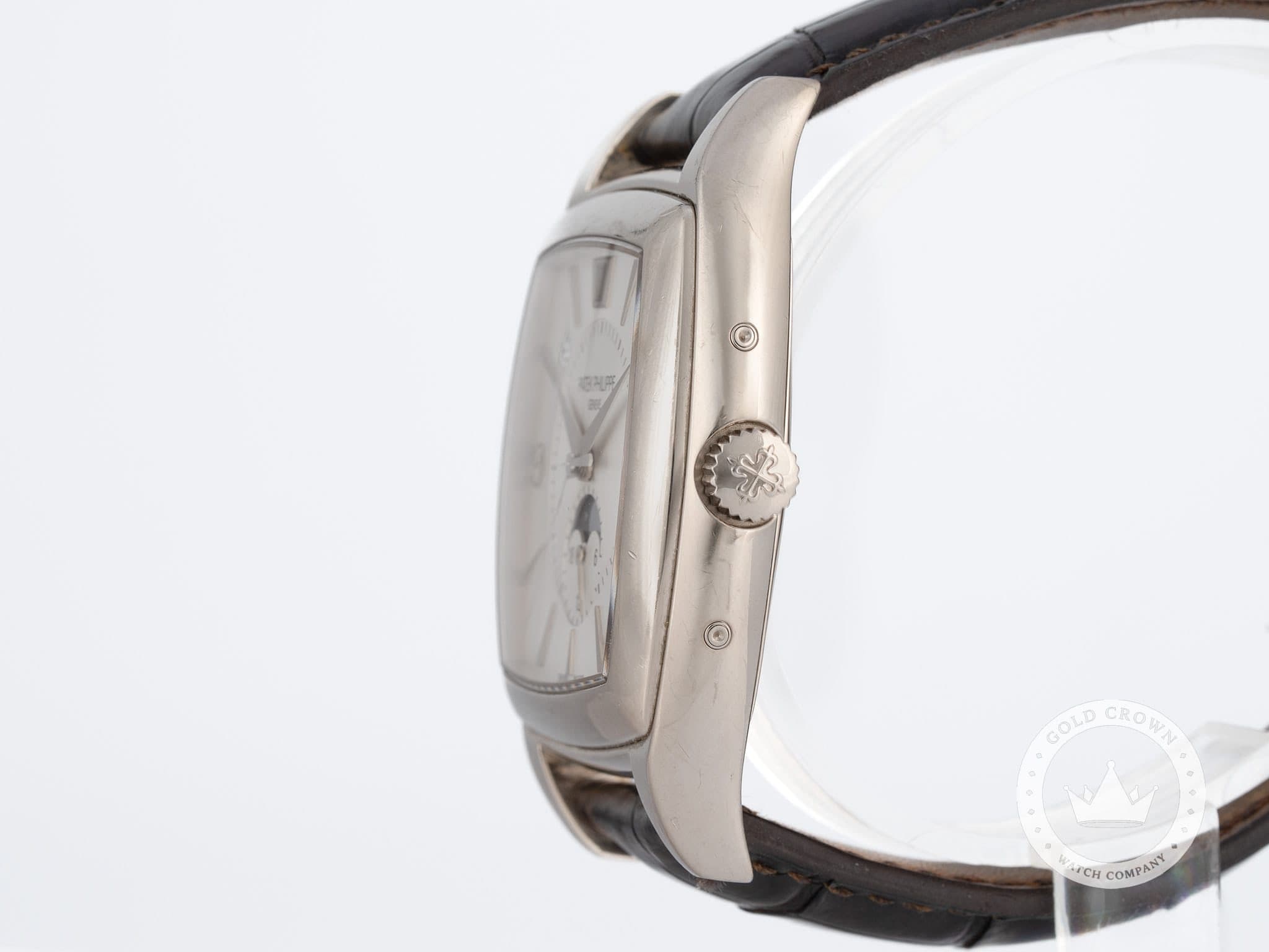 May be an image of digital watch and text that says 'GOLD COLDCROVINI CRO WN CH C COMPANY'