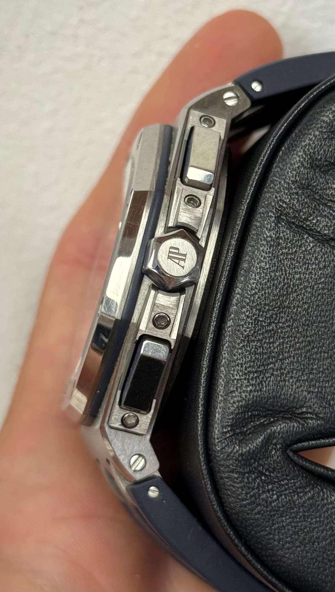 May be an image of lighter and wrist watch
